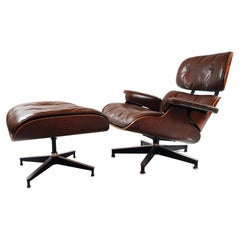1st Edition Eames Armchair and Ottoman by Herman Miller, Brown Leather, 1950s