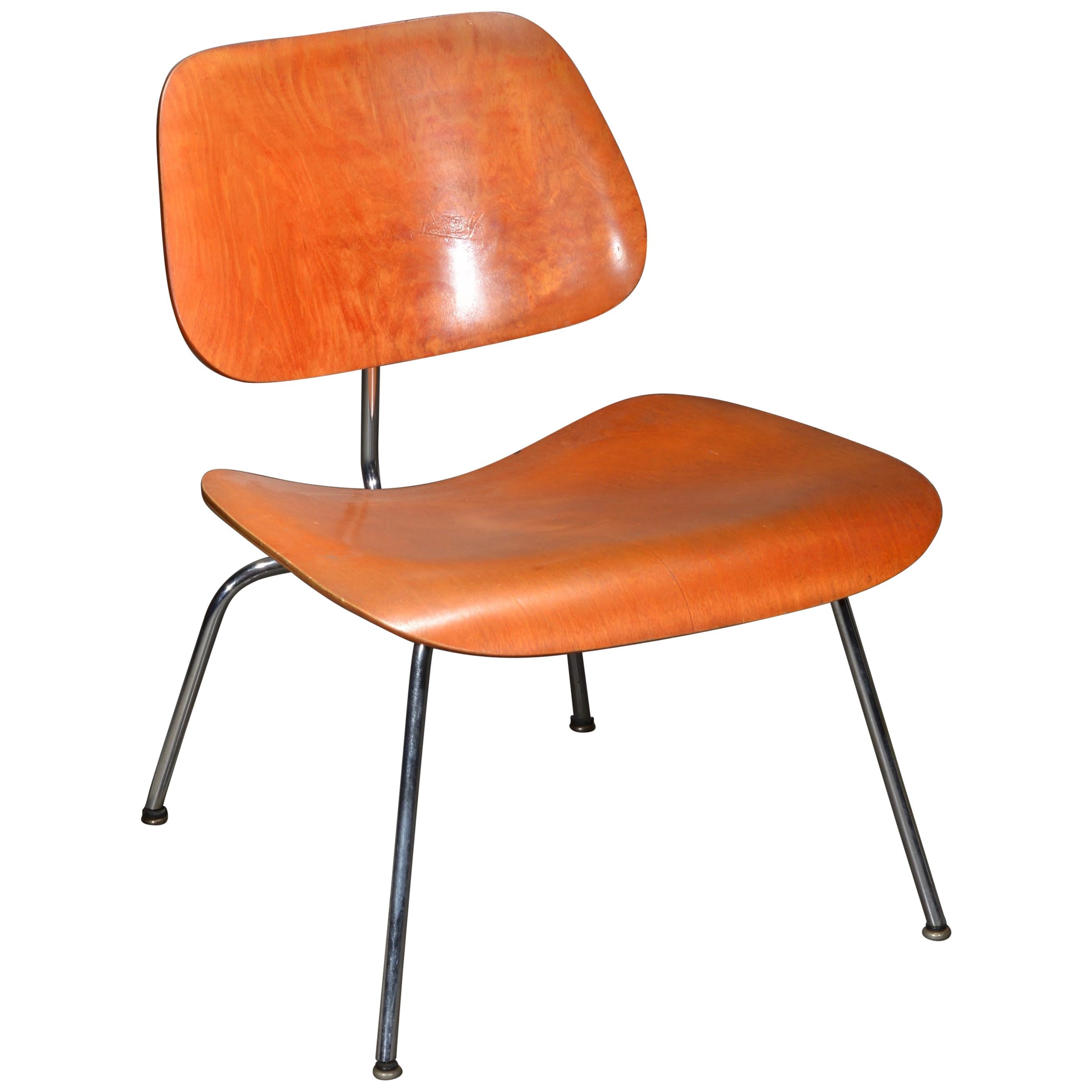 First Edition Evans Red Analine Lcm Chair by Charles and Ray Eames