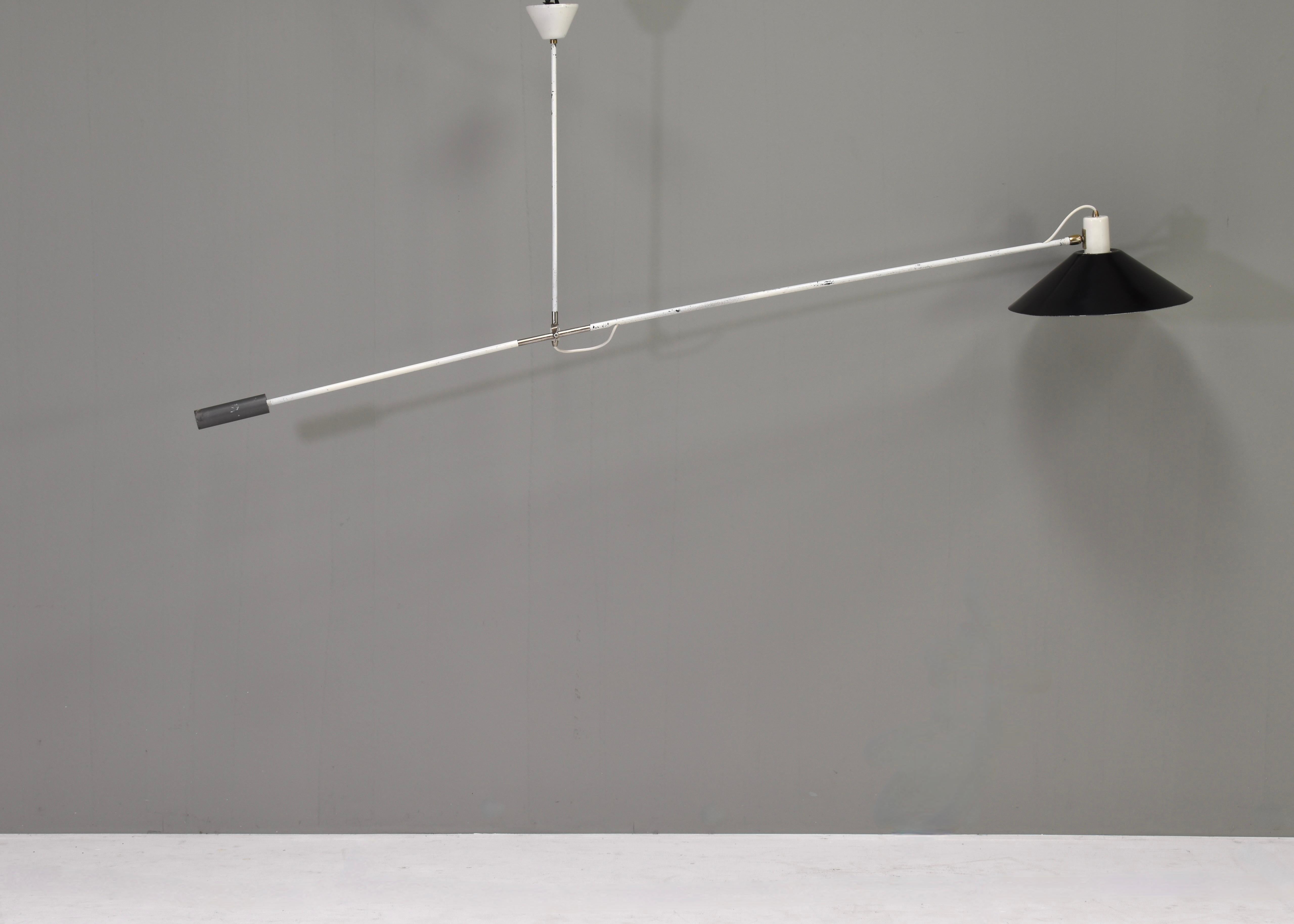 1st edition sculptural counter balance ceiling lamp designed by JJM Hoogervorst for Anvia Almelo, Holland, 1955.

This lamp is an early 1950s edition, not compared to the later one with plastic details this edition is fully made of metal. This