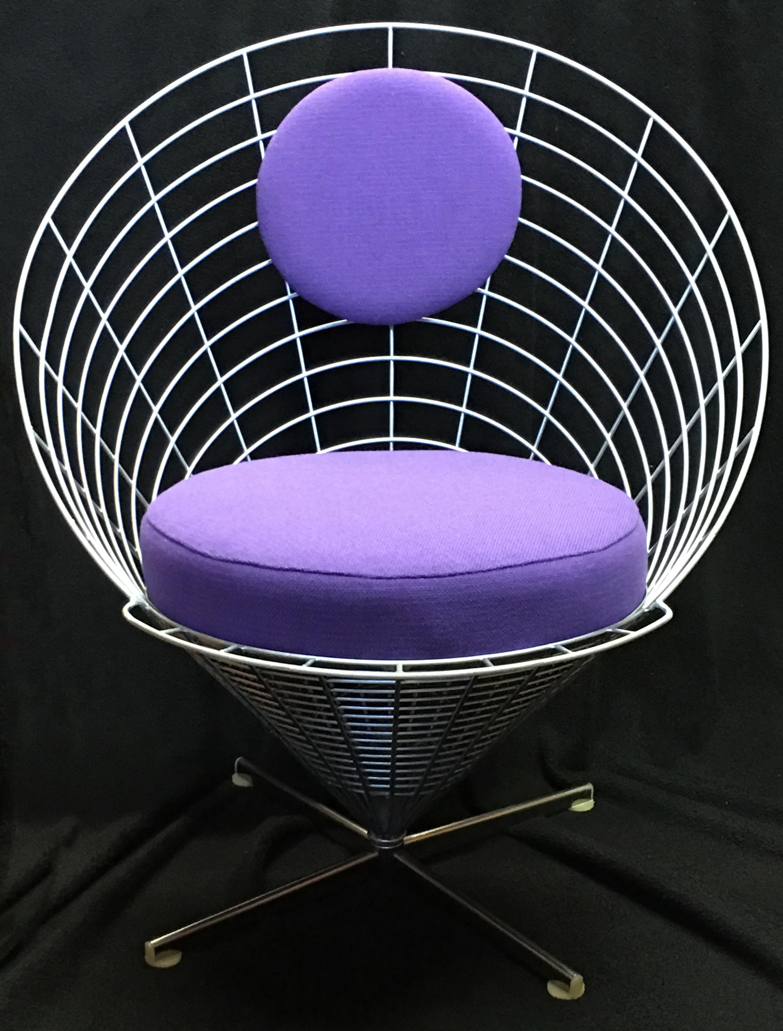A very good original 1st Edition of Verner Panton's wire cone chair, model 'k2' with zinc plated finish. It has the original bolt and washer, which, by putting the washer the other way up, allows the chair to be locked in one position, or allowed to