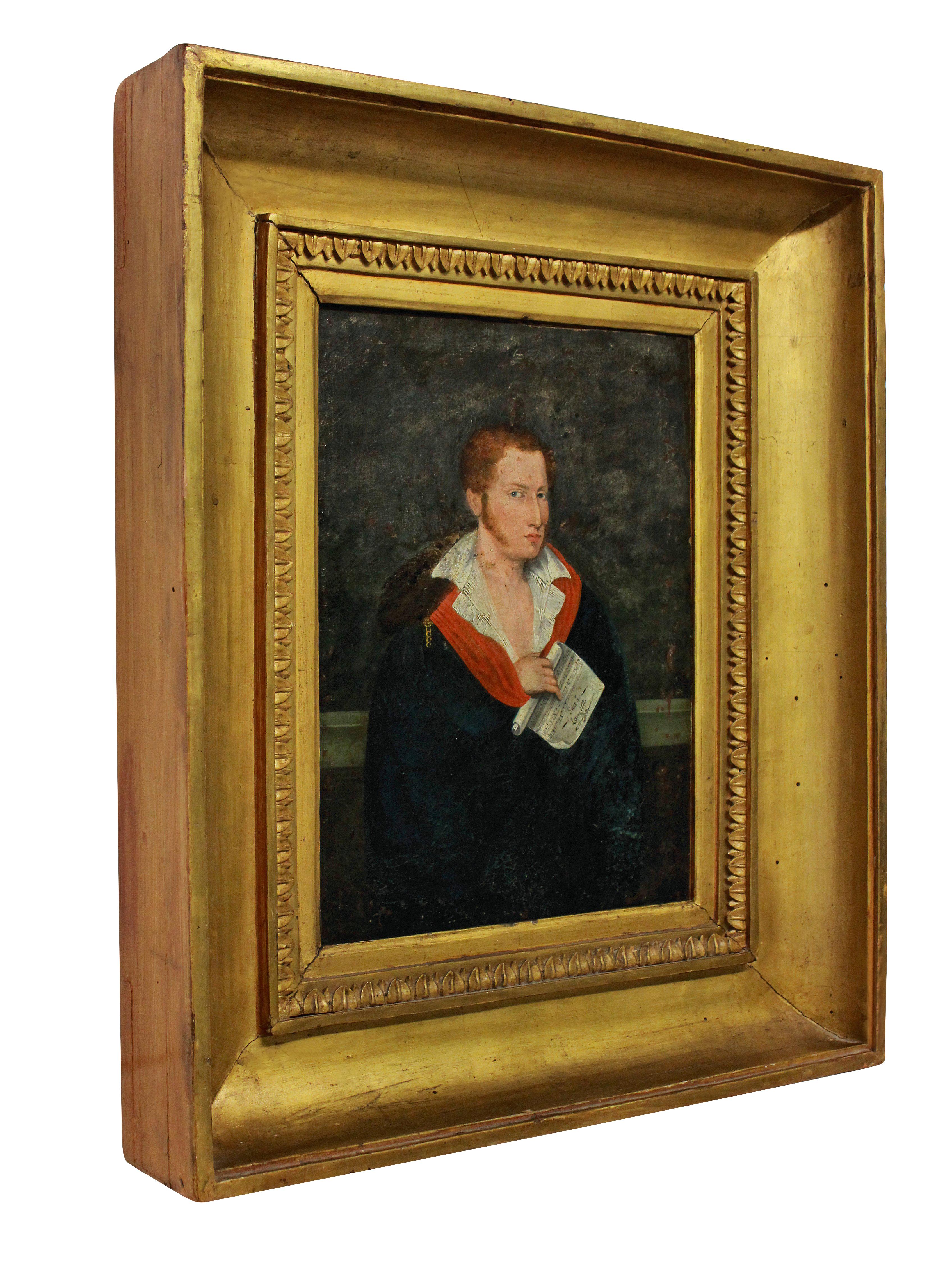 A French 1st Empire oil painting of an enigmatic red haired young man in aristocratic clothing. He clutches a musical manuscript. The water gilded frame is the original and the canvas has been laid on to board at some stage.