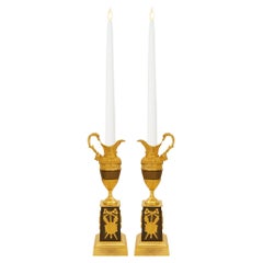 1st Empire Period patinated Bronze and Ormolu candlesticks, circa 1805
