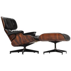 1st Generation Eames Chair and Ottoman in Rosewood