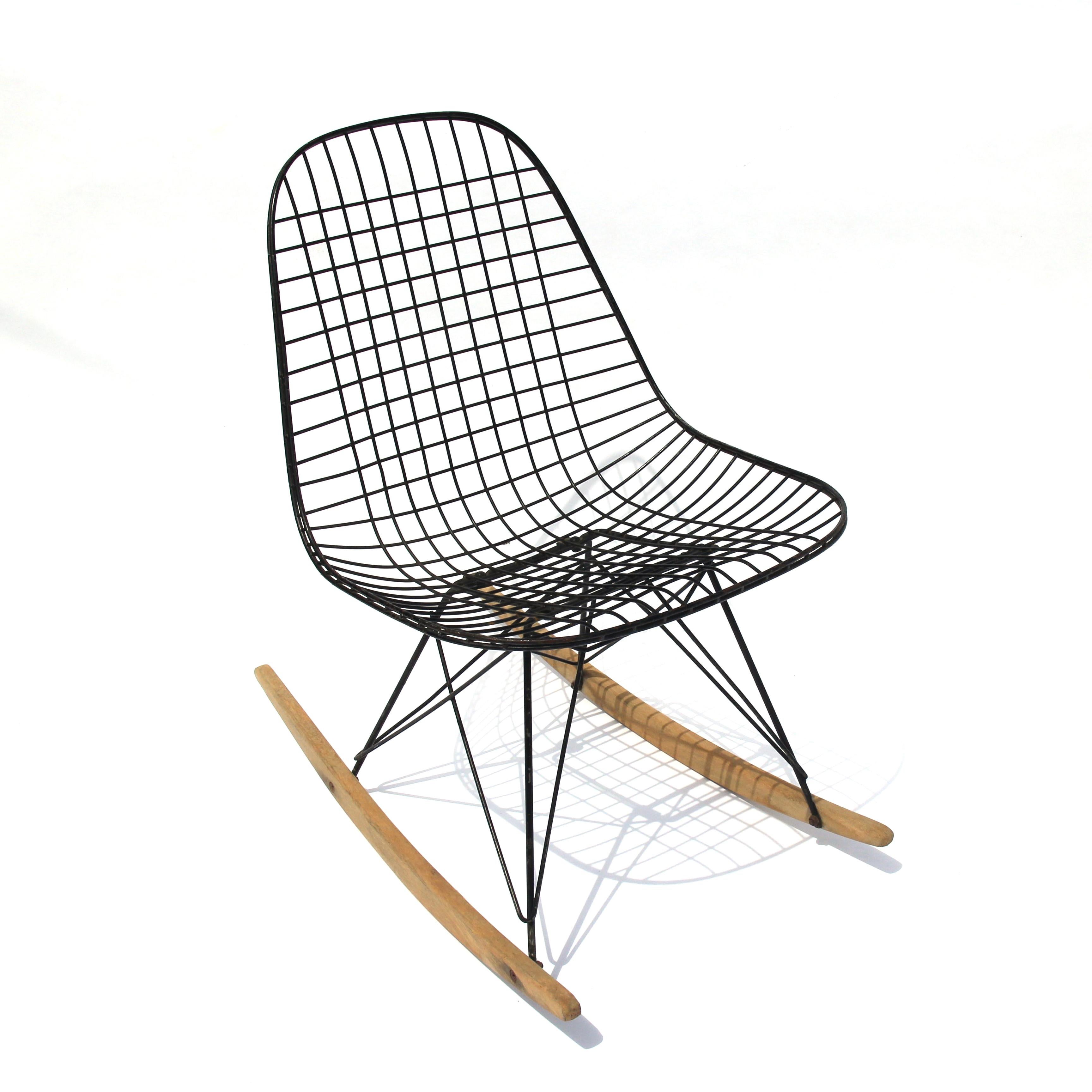 Charles and Ray Eames designed their fiberglass and wire chairs to be fitted with a wide variety of bases to offer a range of heights, uses, and aesthetics. One of the most desirable today is the rocker. This rare early example of the RKR dates from