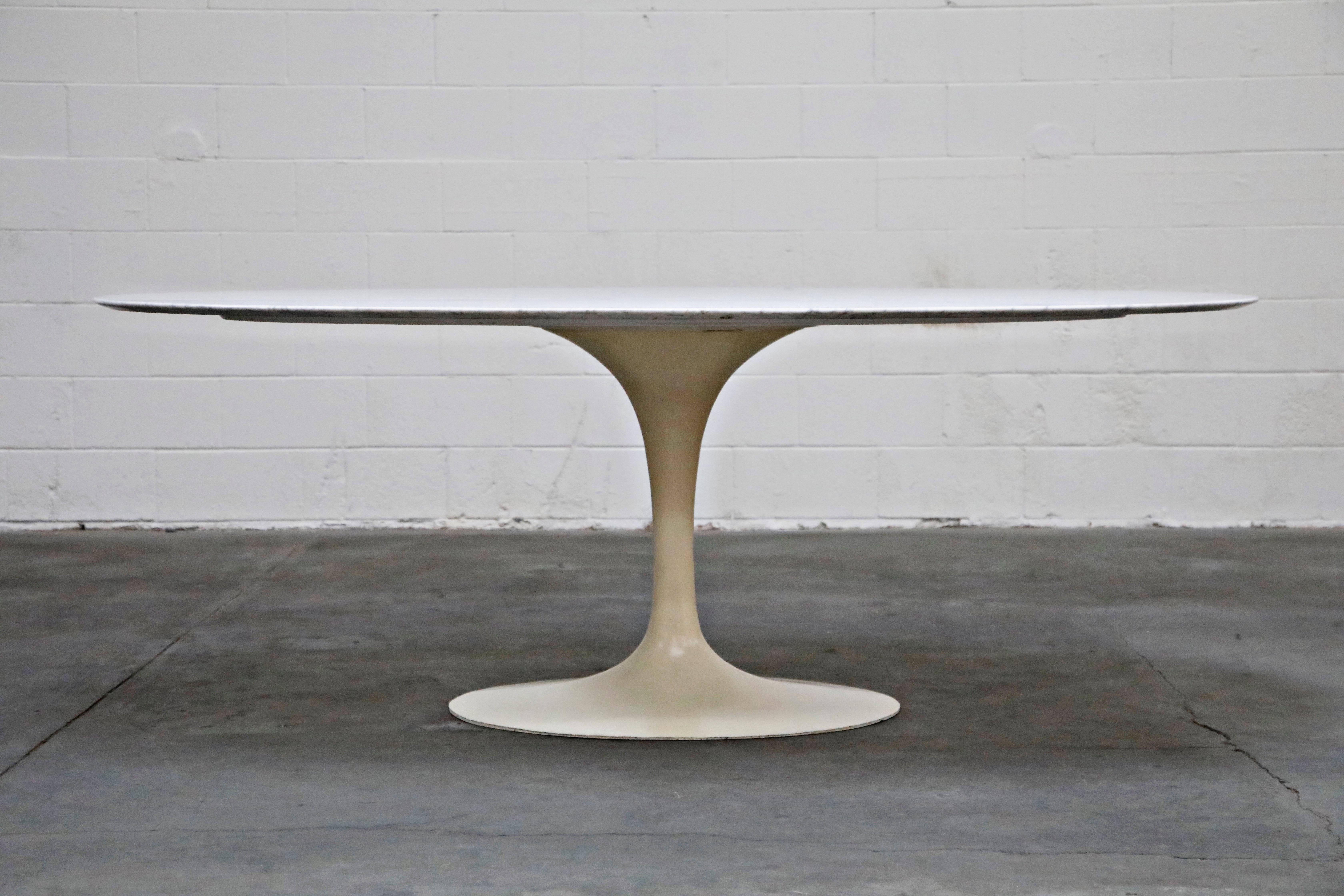 Often considered by designers and collectors as the pièce de résistance of marble dining tables, this 1st Generation, early production year (possibly 1st year of production), triple signed Knoll Associates white marble 'Tulip' dining table is the