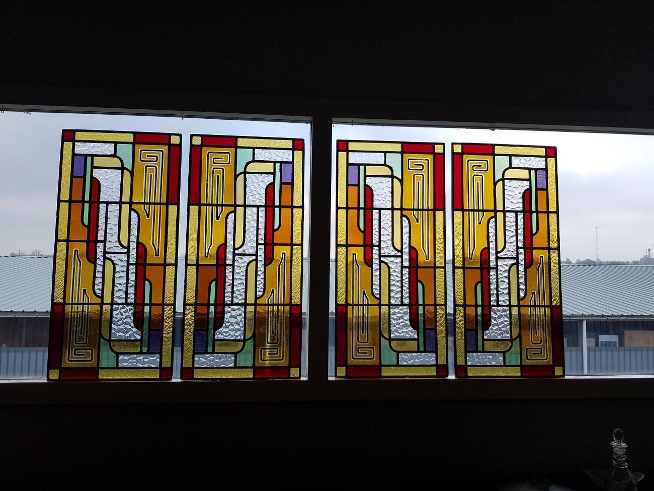 Gorgeous stained glass four-panel window from the first half of the 20th century, consisting of four windows with very bright colors and spectacular combination pattern (all parts are in mint condition).

The measurements are per piece:
Depth 1
