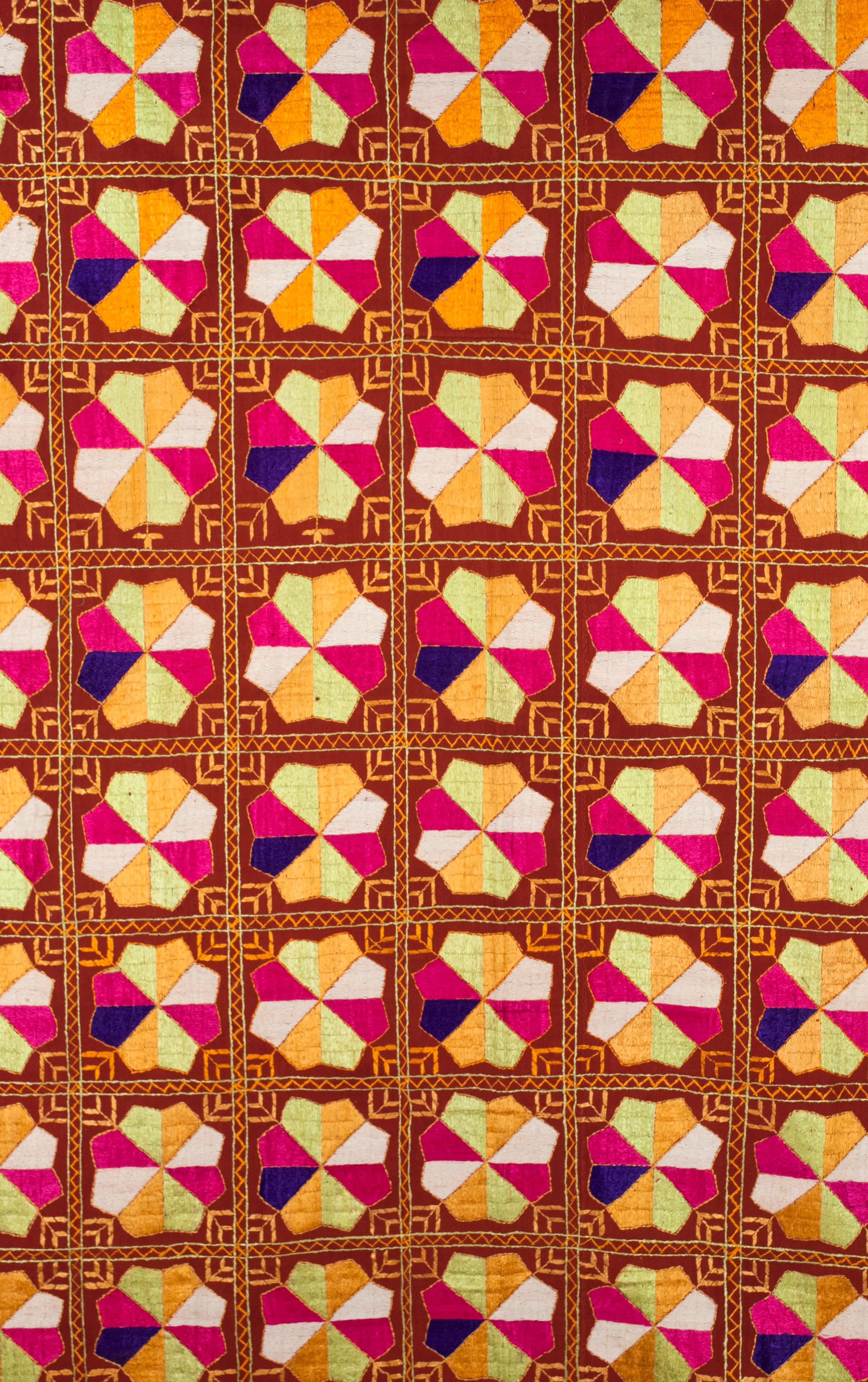 1st Half 20th Century Indian Woman’s Shawl / Phulkari

This large vibrant woman’s shawl is almost completely covered with dense silk-floss embroidery on a sturdy cotton 'khaddar' ground cloth. From east Punjab, north India.







 
