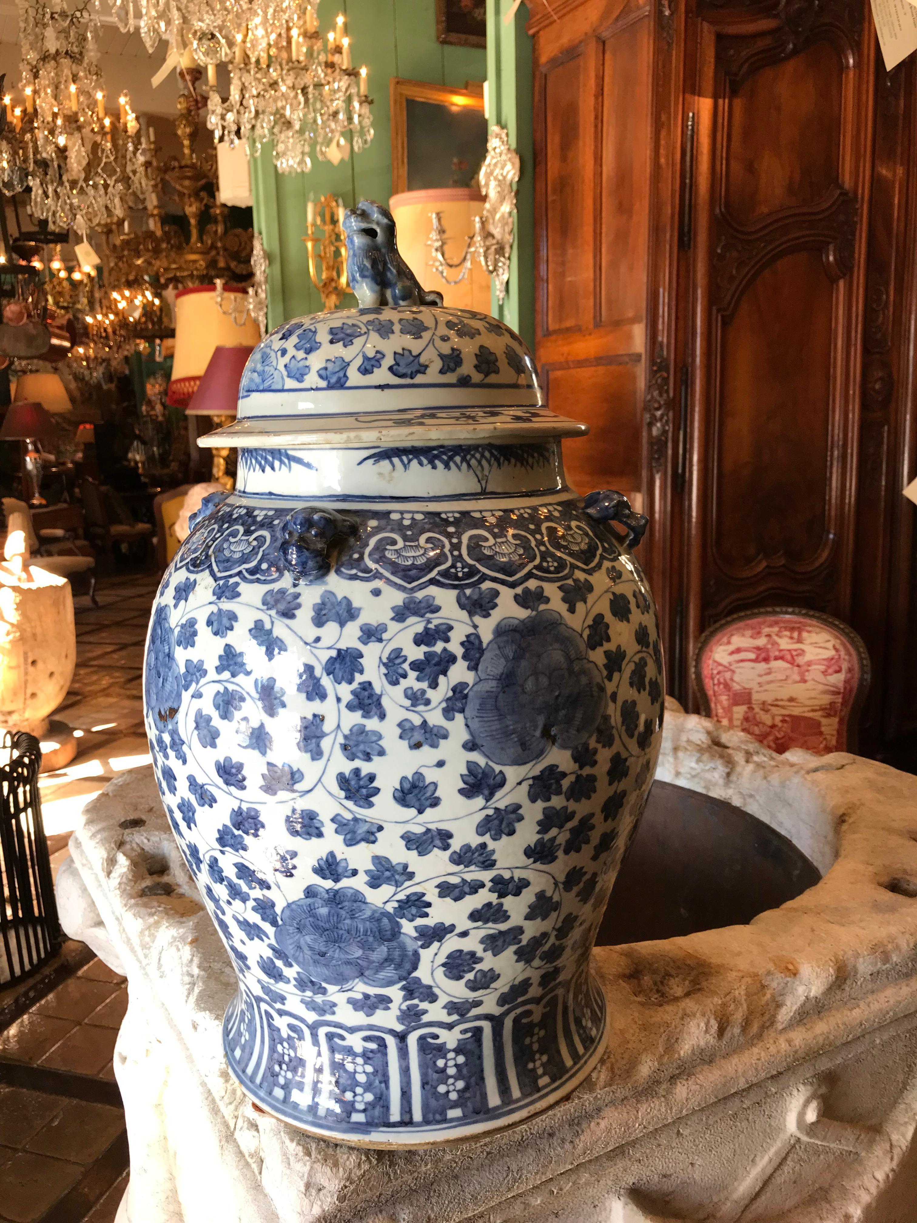 Important 1st quarter 19th century Circa 1800-1825 blue & white Chinoiserie China lidded temple jar Antiques depicting chrysanthemums flowers and leaves . Chrysanthemums, which symbolize happiness and vitality, are a popular autumn flower in China