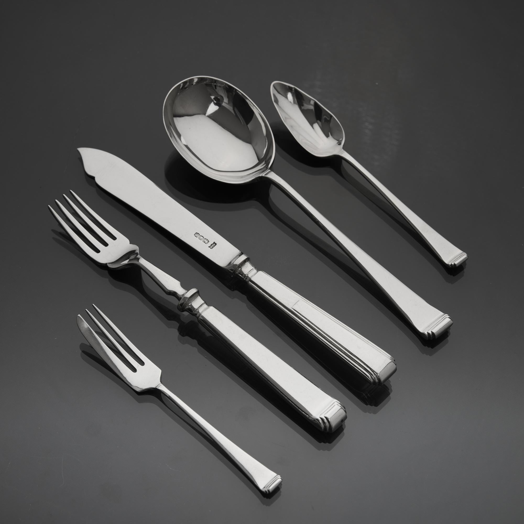 British Set of Art Deco style Tudor pattern silver cutlery for 12 For Sale
