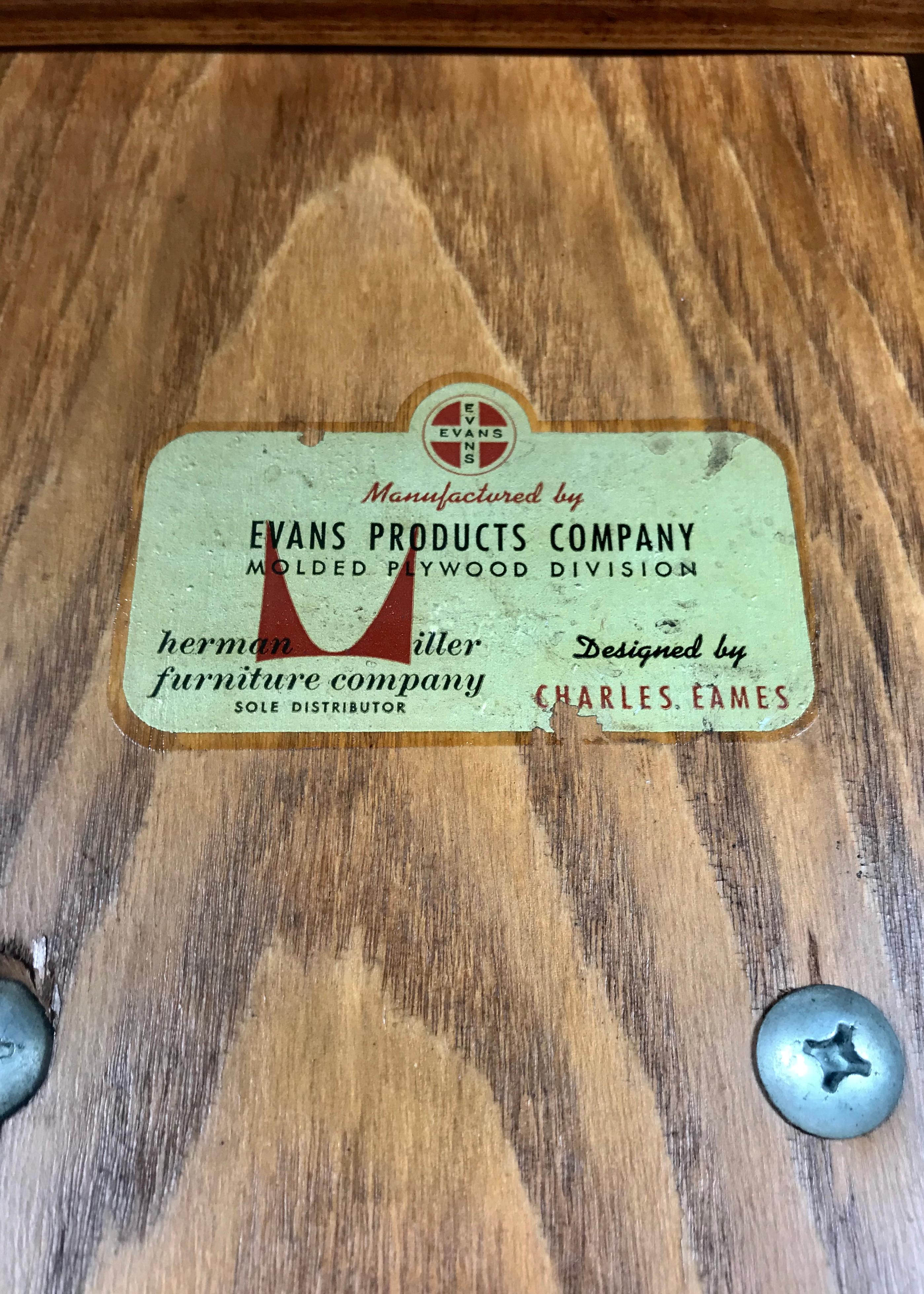 1st year production Charles Eames L C W (lounge chair wood), circa 1945-1946 Retains original early Evans label. Beautiful example in ash, museum quality, amazing graining, 5-2-5 screw configuration, oval shock mount. Stunning, these early plywood