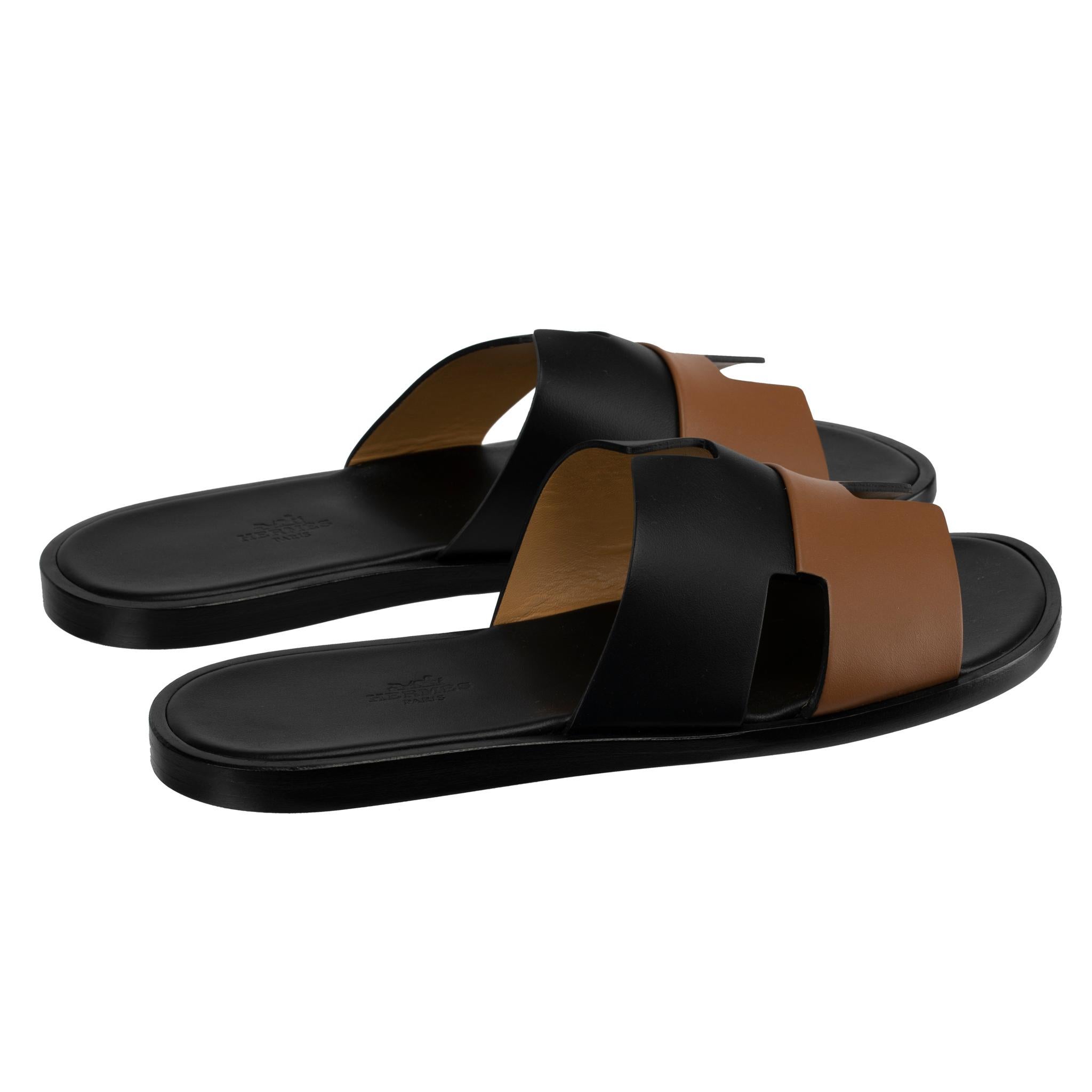 1stdibs Exclusives From Three Over Six

Brand: Hermes
Style: Izmir Sandal
Size: 41 FR
Color: Gold and Black
Leather: Smooth

Condition: Pristine, never used: The item has never been used and is in pristine condition complete with all