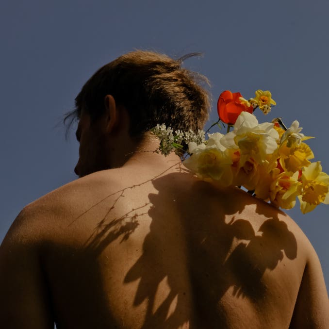 The Man With The Flowers