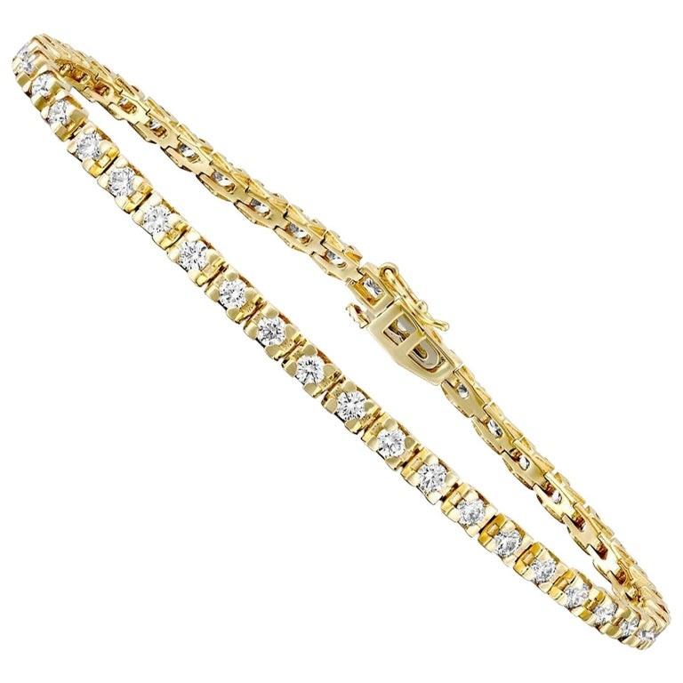 2 carat tennis bracelet yellow gold