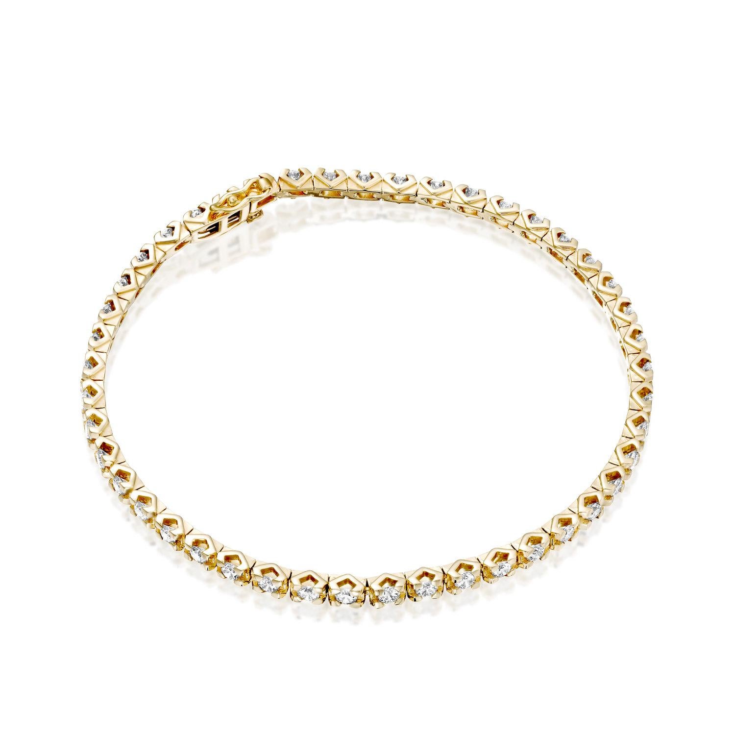 A beautiful large and classic diamond bracelet made of 14K Yellow Gold set with Natural Diamonds.bThe total carat weight of this beautiful Diamond bracelet is 2 1/2 carat, D-F color and VS clarity. 

  
Metal Type: 
This bracelet can be made in