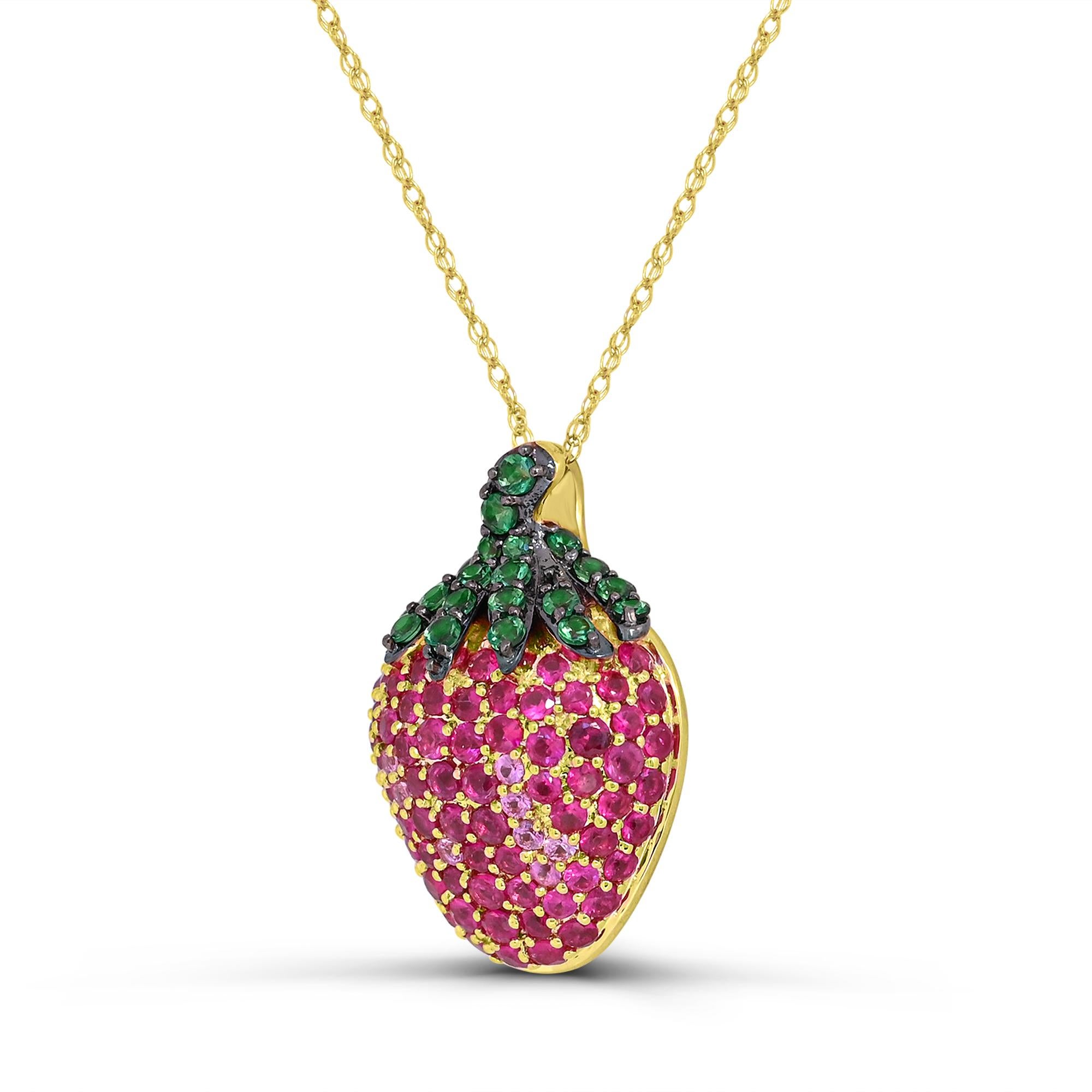 Indulge in the adorable design of our Ruby, Pink Sapphire and Tsavorite Strawberry Pendant Necklace in 14K Yellow Gold. Crafted with meticulous attention to detail, this necklace boasts a stunning combination of round rubies, sparkling round pink