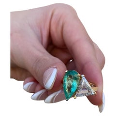(2/2) 2.70 Carat Colombian Emerald and 1.5 Diamond Two Stone Ring