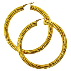 Créoles italiennes Unoaerre en or jaune 18 carats de 2 3/8 pouces de diamètre