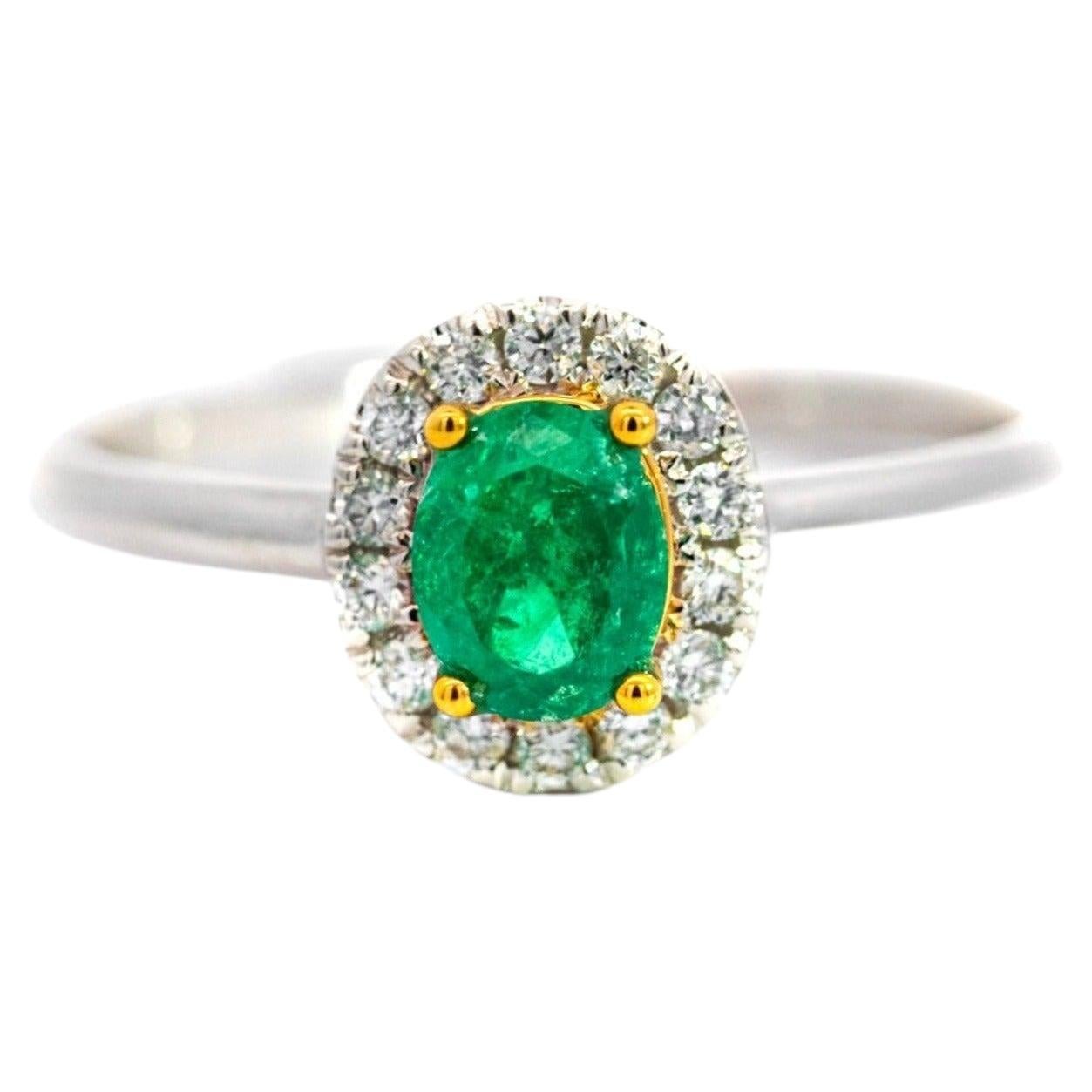 2/3 Carat Natural Emerald & Diamond Oval Halo 1.7mm Band Ring in 18K White Gold For Sale