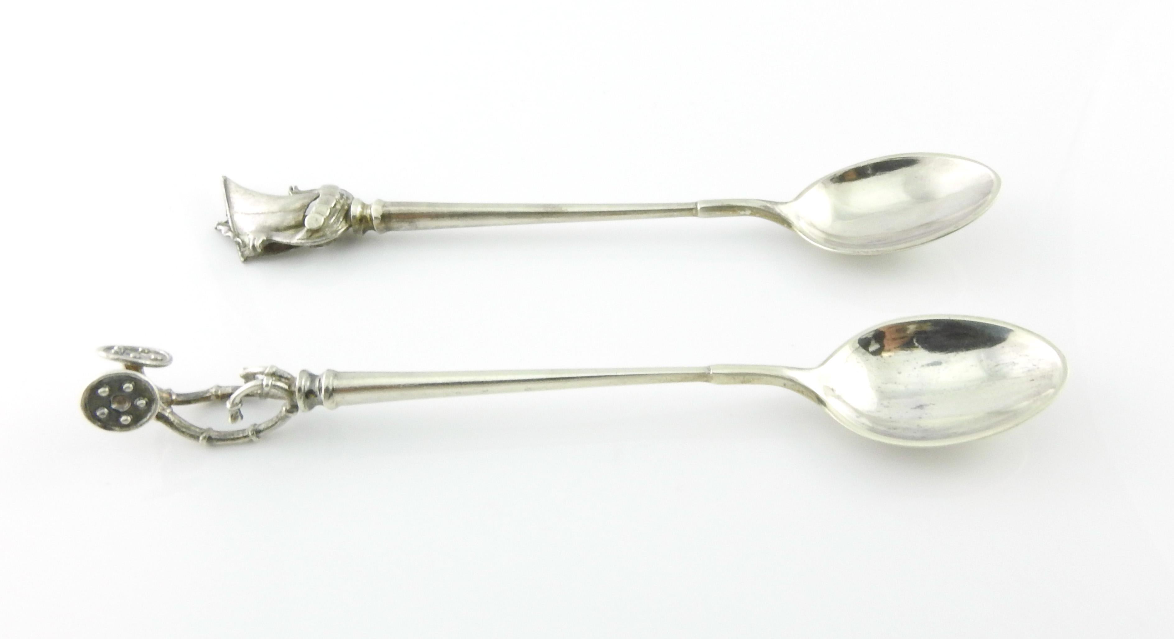 2 Aage Weimer sterling silver Denmark demitasse spoons,
 1 featuring a Viking ship and 1 featuring horns. 
Marked: Aa.W, STERLING DENMARK. 
Measures: 4 3/8
