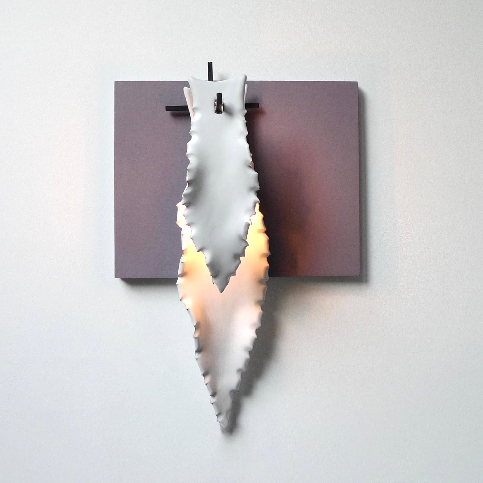 2 agave leafs wall light by Sander Bottinga
Dimensions: H 54 x W 12 x D 13 cm
Materials: Ceramic, forged iron

Handmade matt white agave leaves in ceramics from the famous ceramic village Grottaglie / Puglia in the south of Italy.
Base in