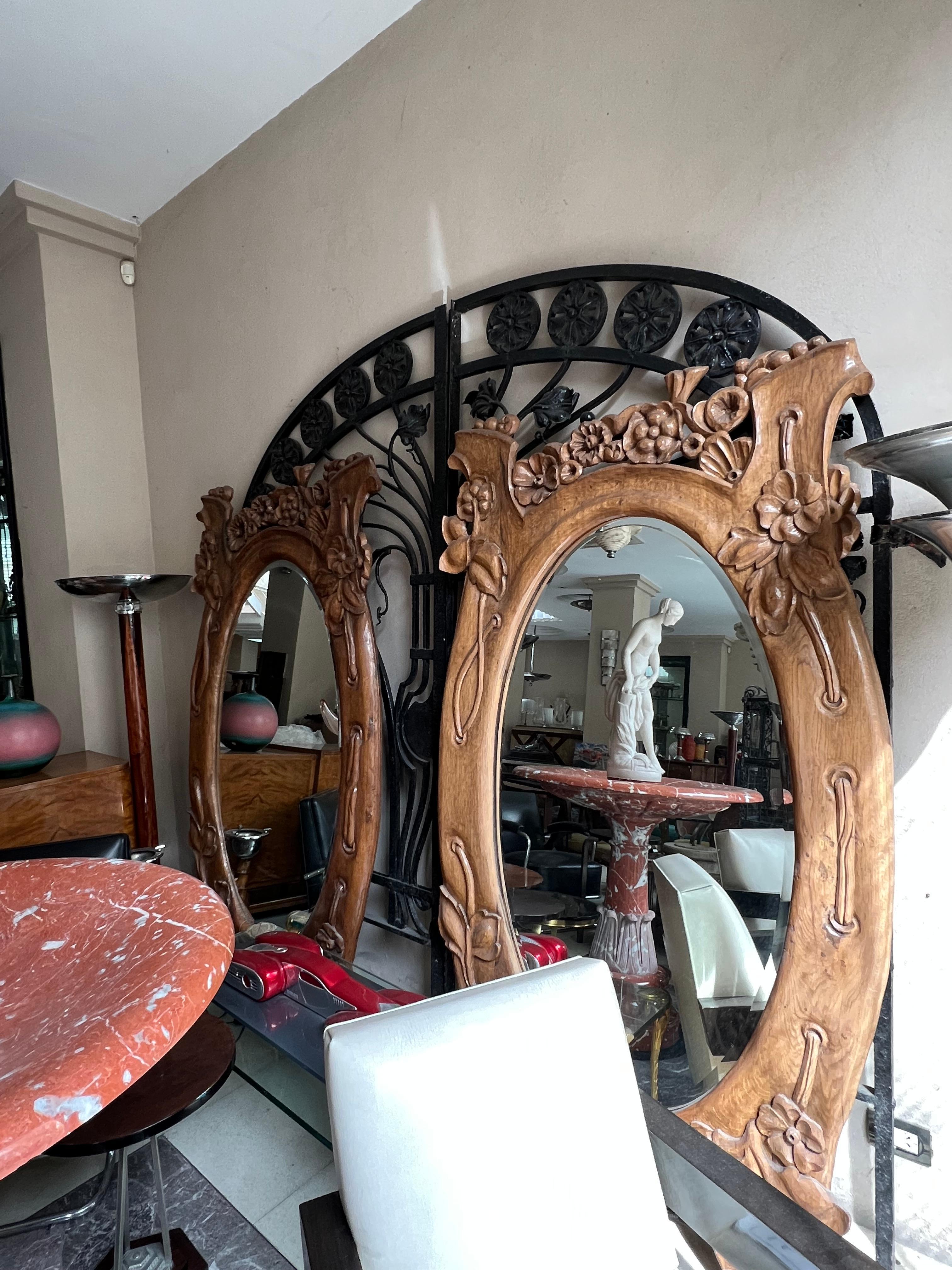 Jugendstil, Art Nouveau, Liberty

Material: wood and mirror
Style: Art Nouveau
Country: France
The depth of the carving of the flowers is a little deeper in one than in the other
We have specialized in the sale of Art Deco and Art Nouveau and