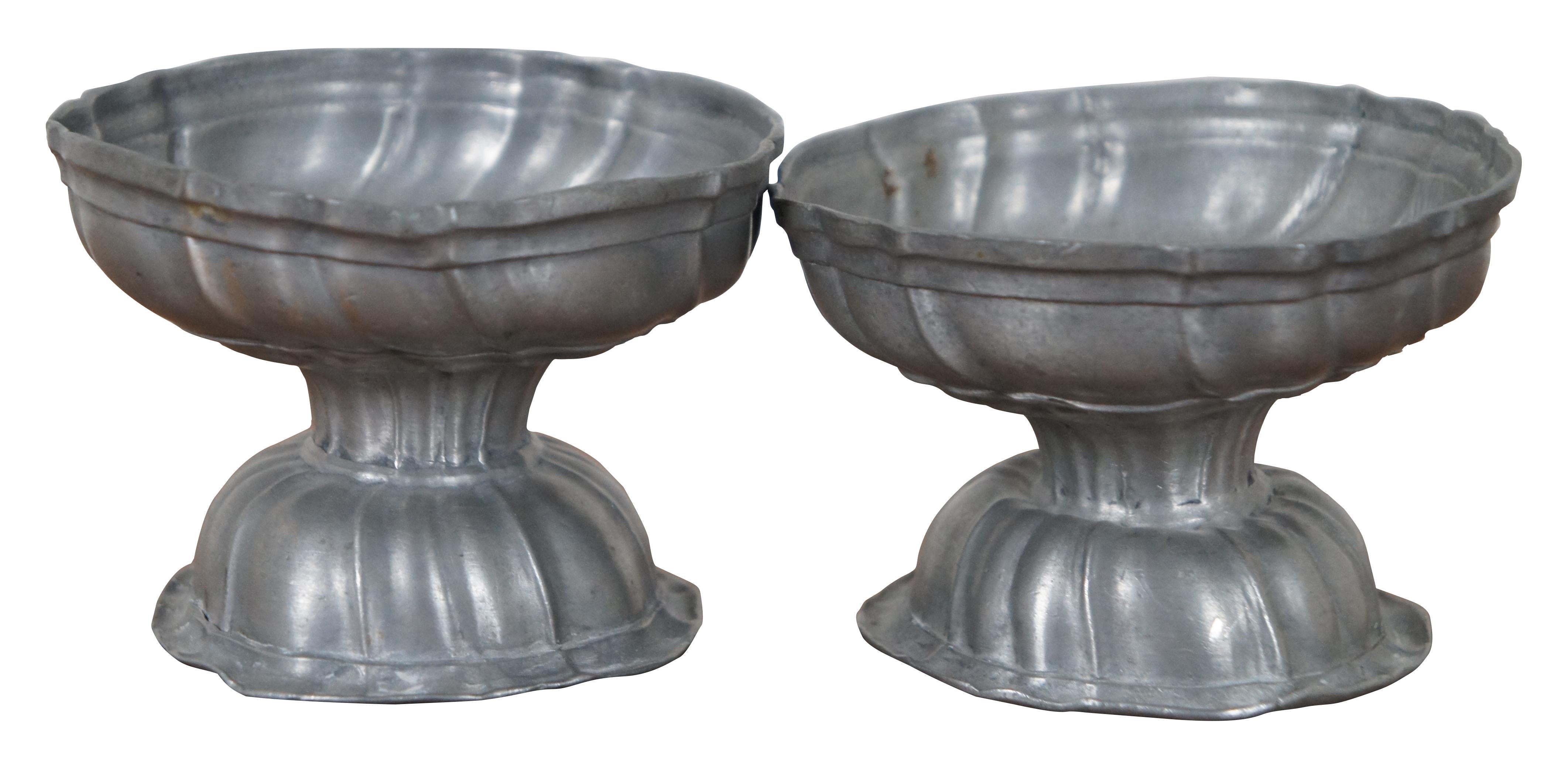 Pair of rare antique 18th century pewter salt cellars / bowls / pedestal dishes or footed cups with unique scalloped and swirled form. Measure: 3