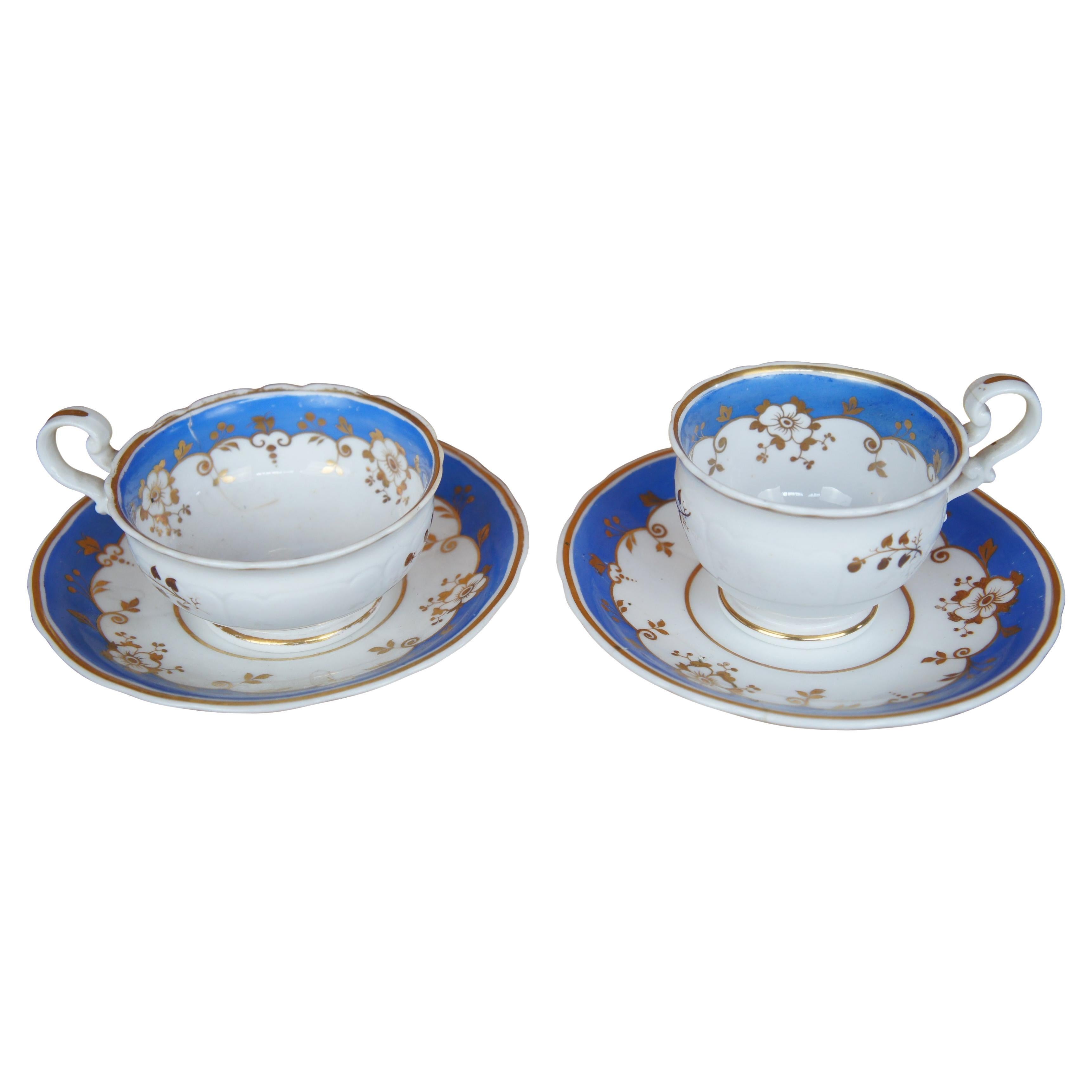 2 tasses et soucoupes anglaises anciennes Samuel Alcock du 19ème siècle en or bleu à motifs floraux
