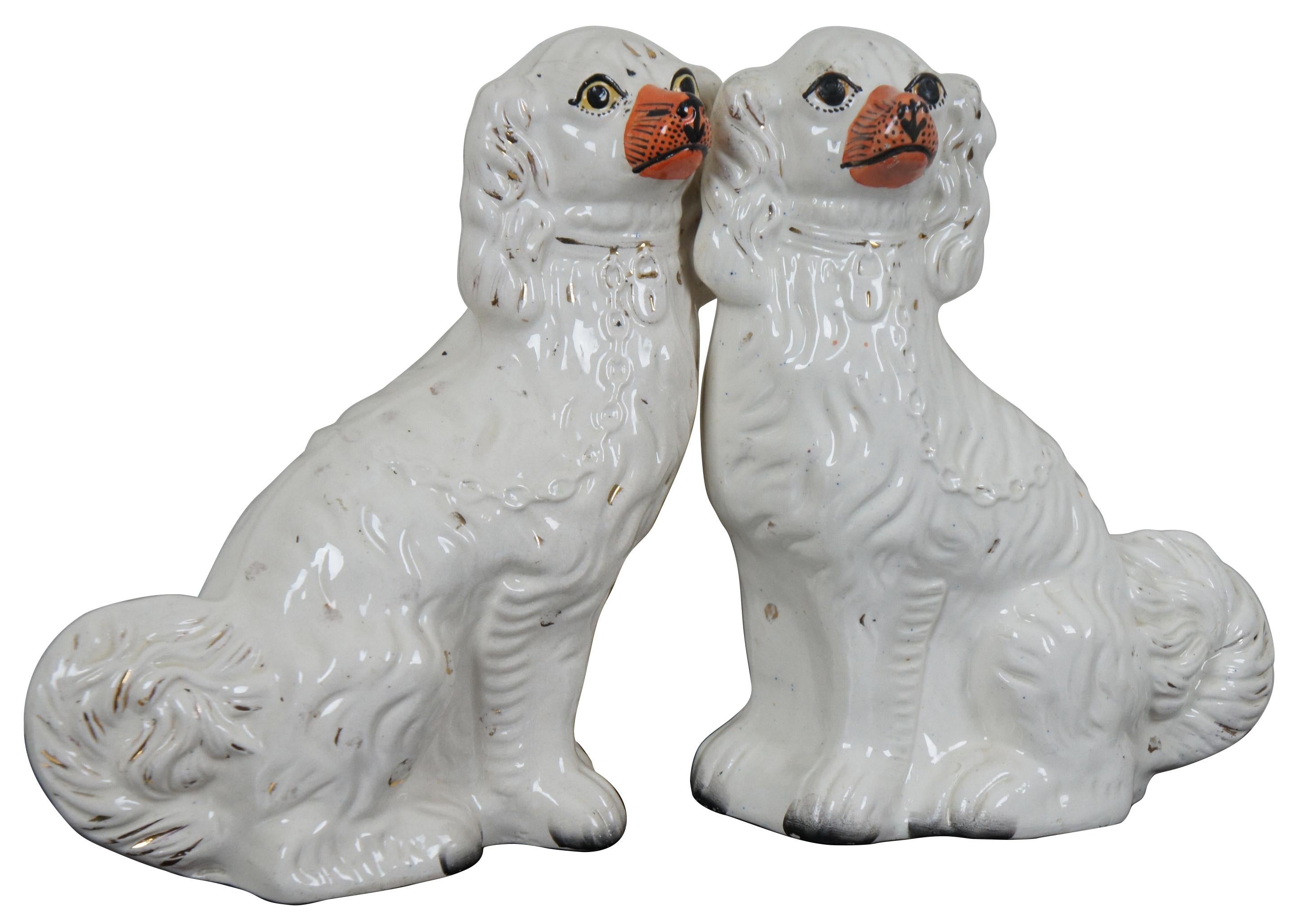 Pair of Staffordshire 19th century cocker spaniel figurines. Measures: 10