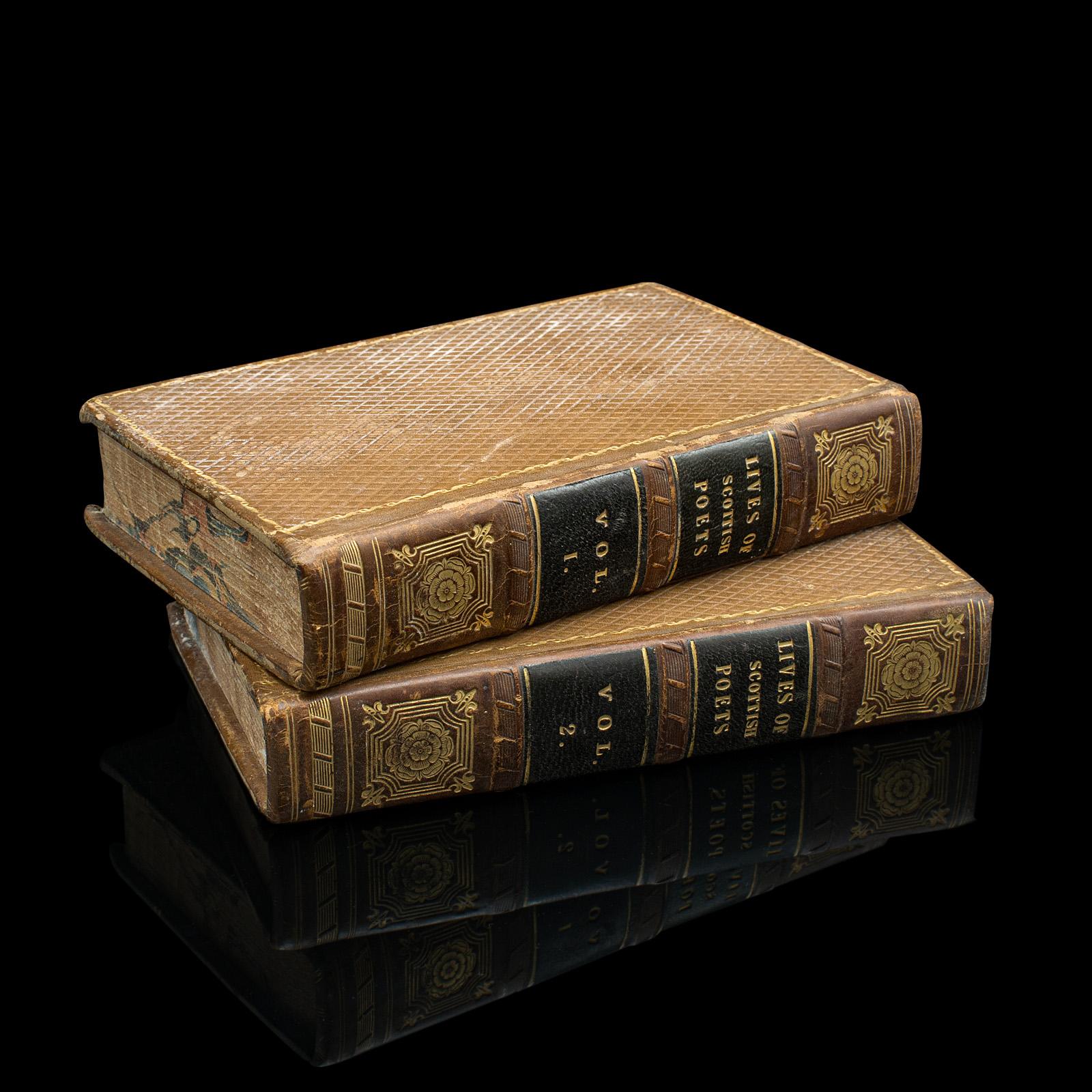 This is a 2 volume antique book set, The Lives of Scottish Poets. An English language biographical work, dating to the Regency period, published 1821.

Presented in good antique condition, intact and lightly time-worn
Hard bound with textured