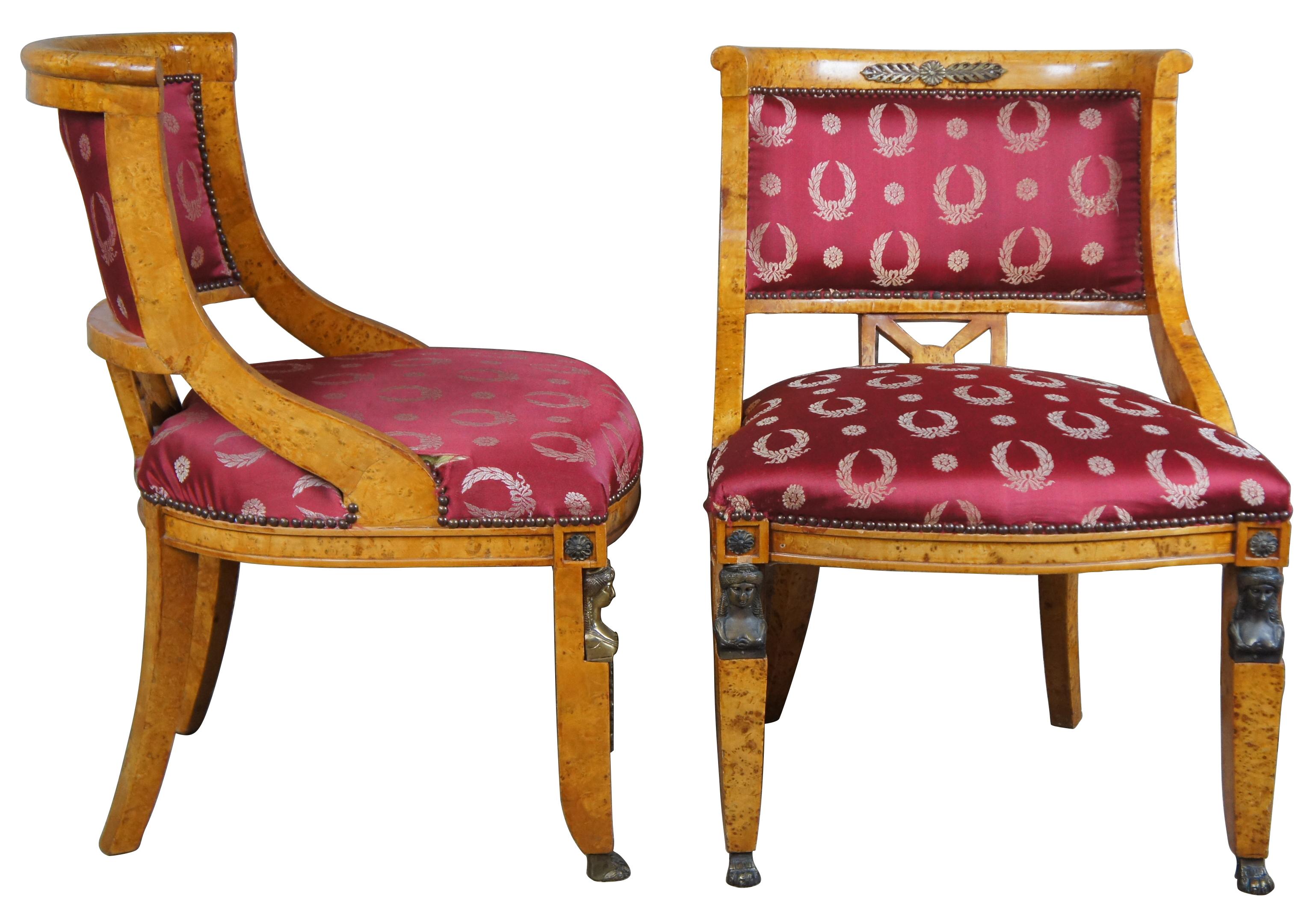 Monumental early 20th century parlor set. A neoclassical and Egyptian revival inspired deisgn. Features a curved rail with unique X back between contoured arms leading to regal striped upholstery. The chairs are supported by square tapered front