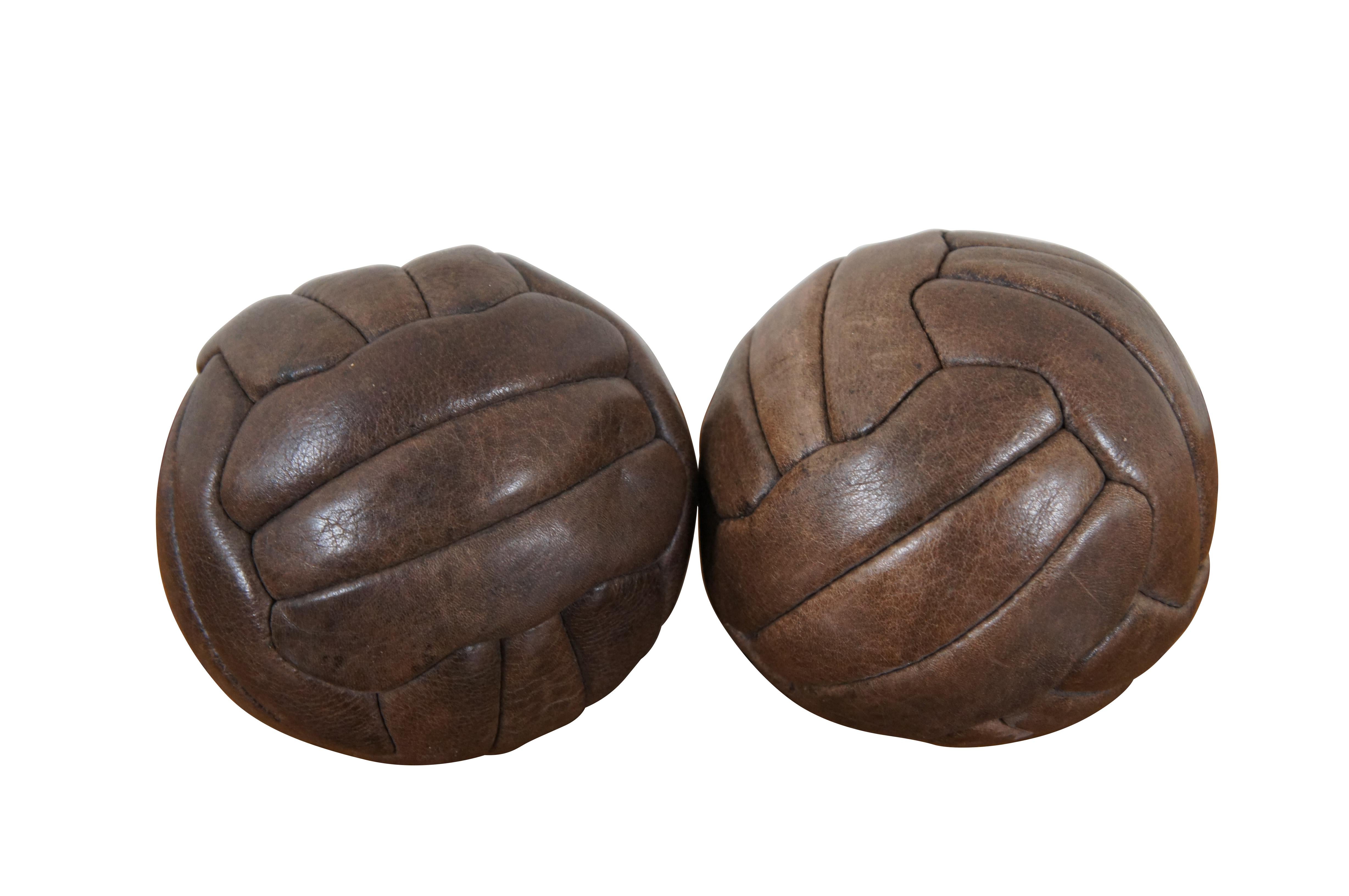 Pair of circa 1930s brown leather footballs / soccer balls manufactured by Mark Cross Company. Made in England.

Dimensions:
5.5