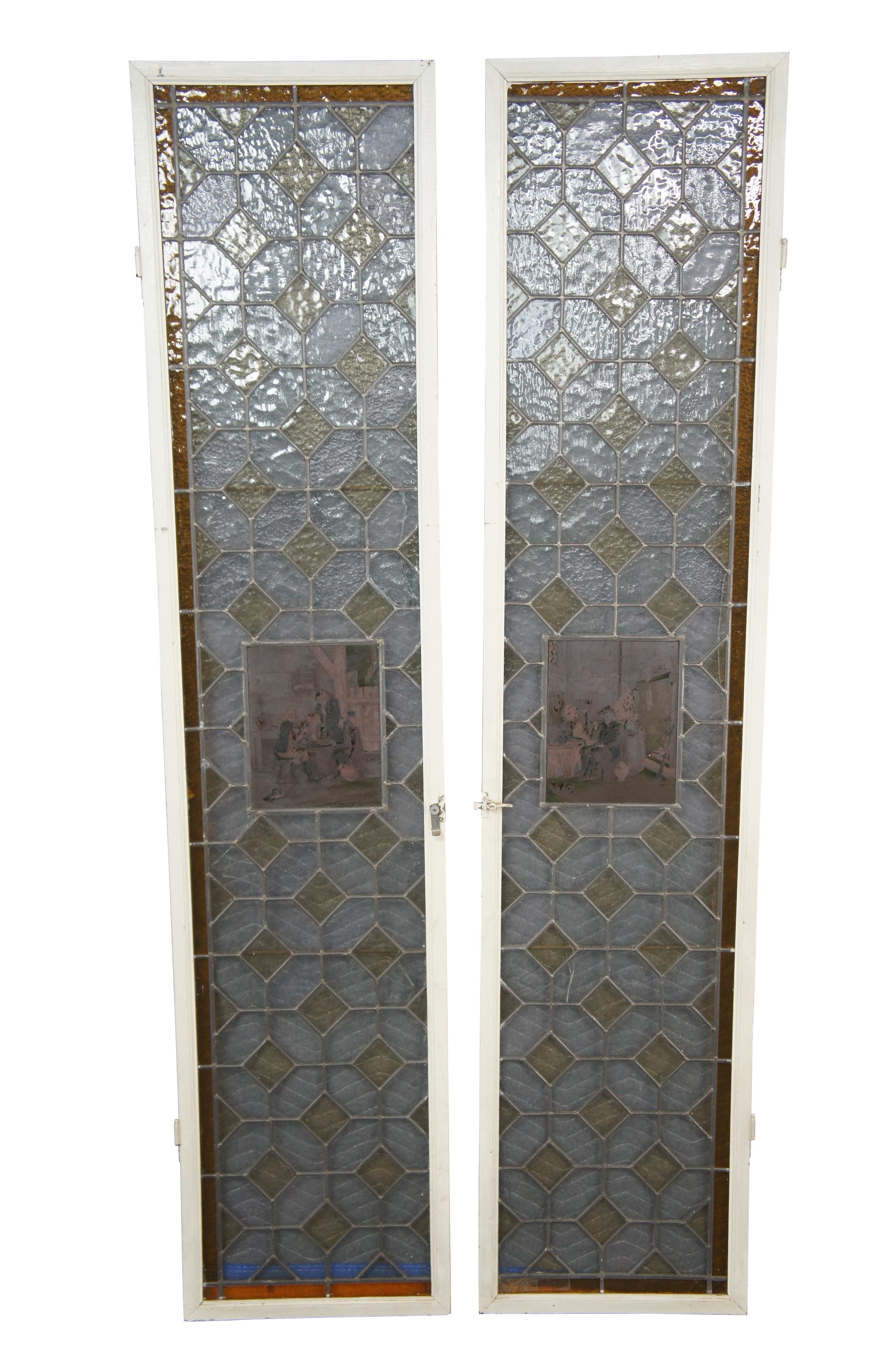 A set of antique European leaded stained glass windows.  Features a geometric diamond pattern set within a wooden frame.  Each window showcases a beautiful painted pub scene at the center.   The windows have a latch at the center from where they