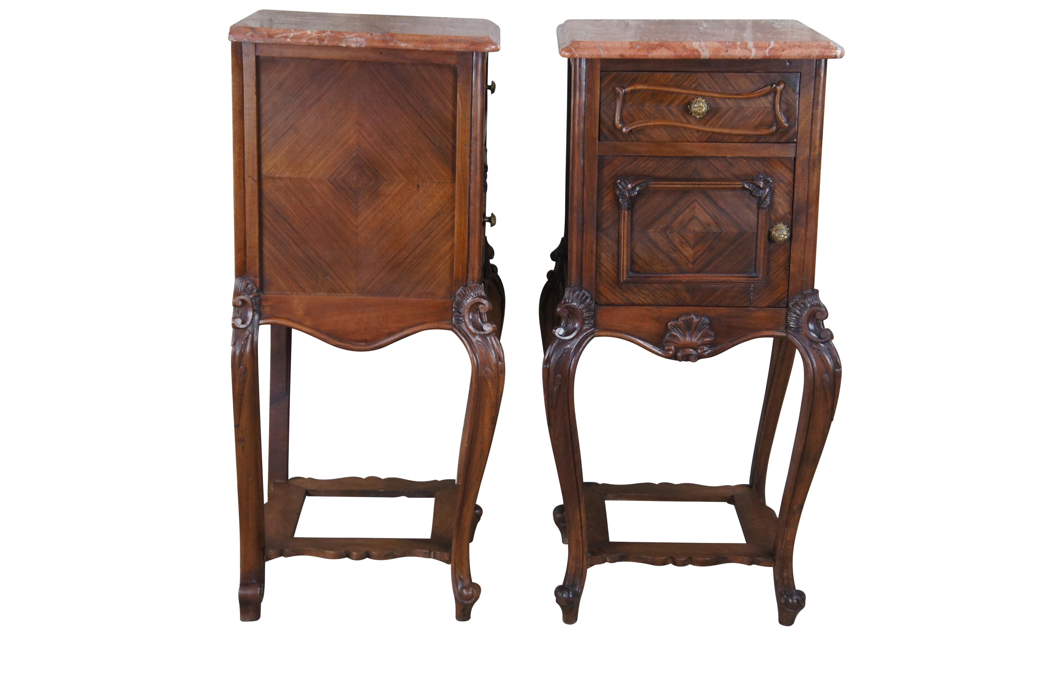 Two antique French tobacco humidor / smoke stands.  Made of matchbook walnut featuring a two tiered serpentine design with marble top, paneled door and cabinet, and cabriole legs.

Dimensions
16