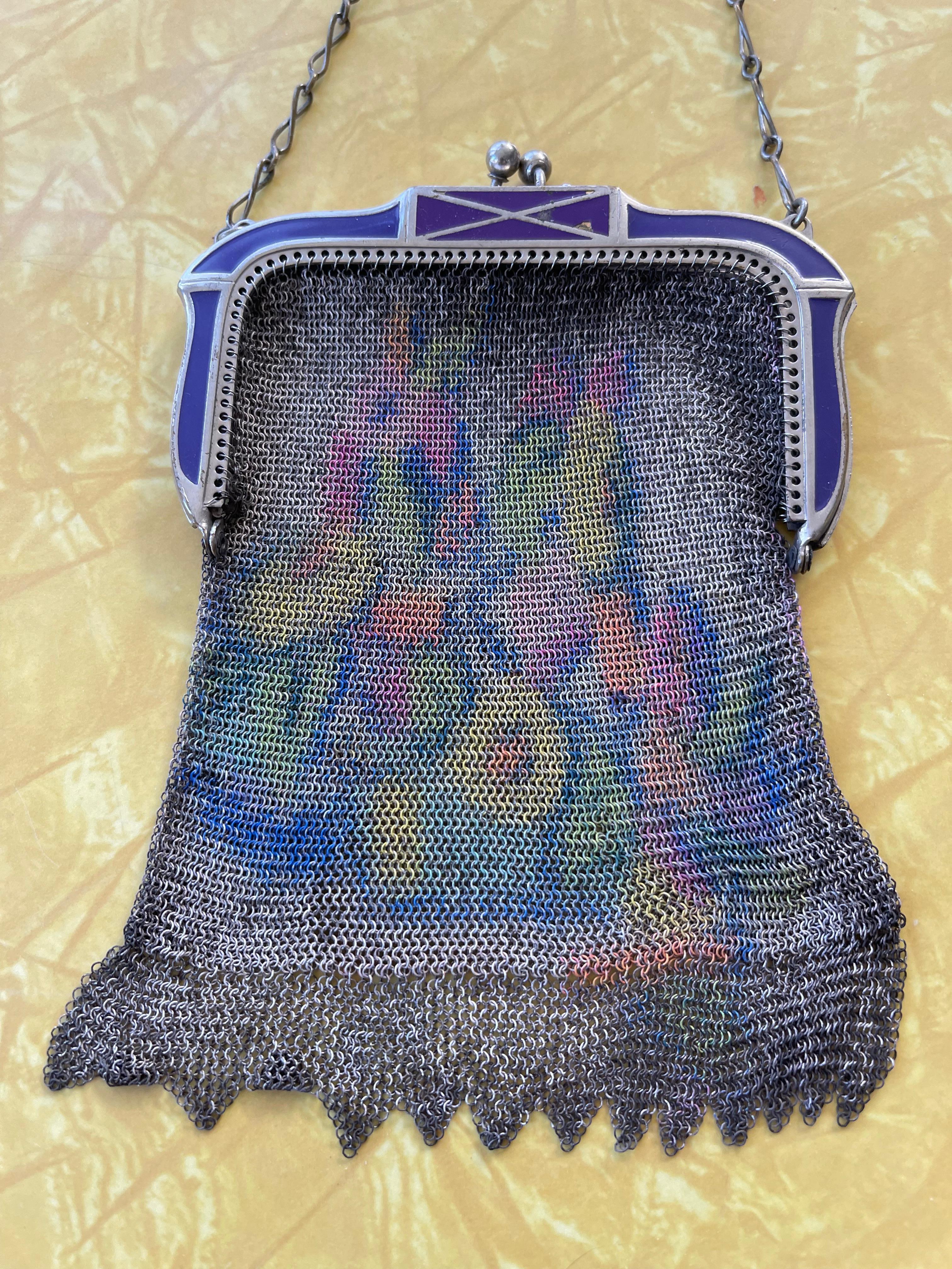  These 2 purses were made at the height of the metal purse craze, the art deco period. The big silvered one is a big beauty and is in fine condition. The little one was made by the highly respected company, Whiting & Davis. That one measures 11''