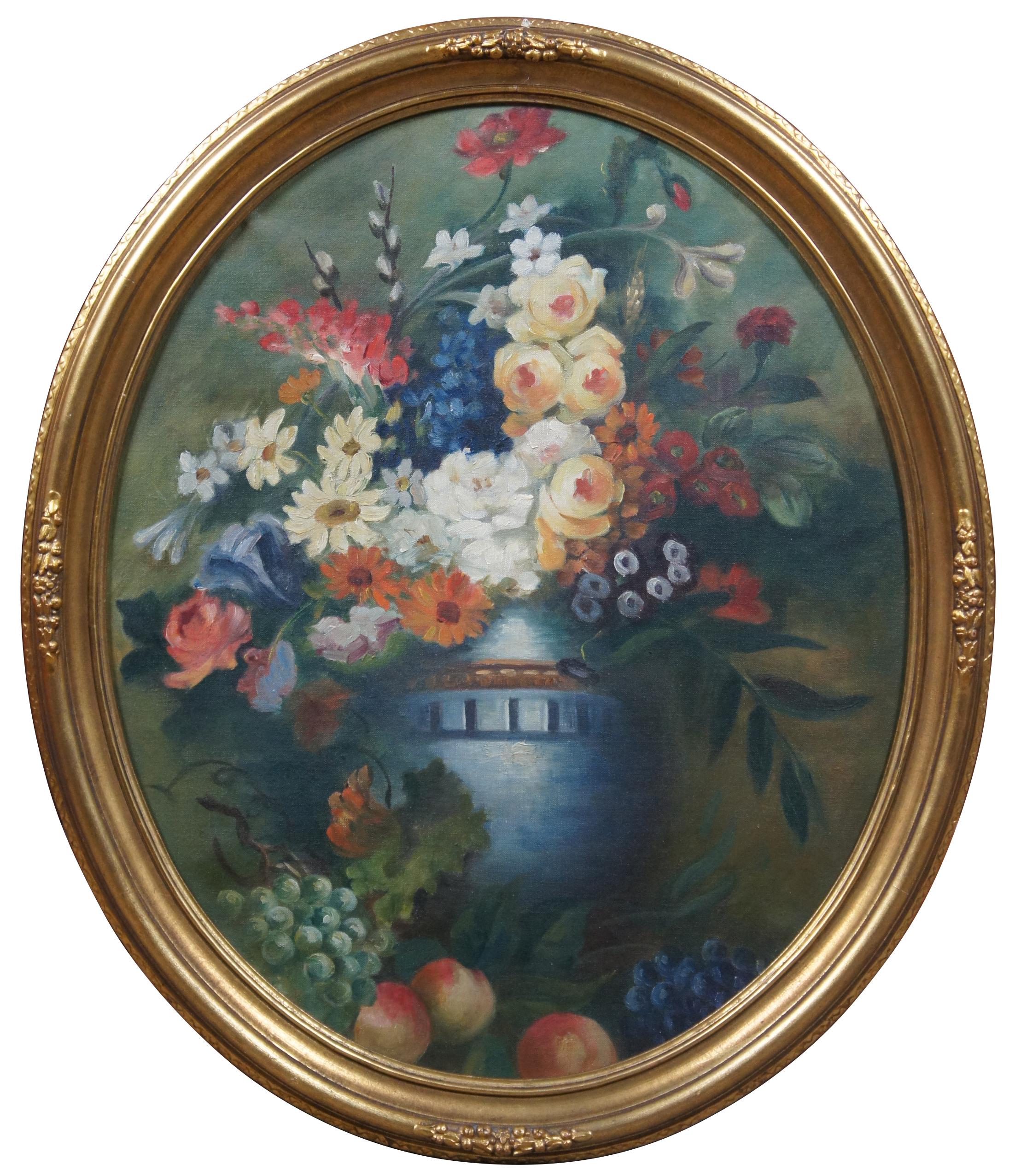 Pair of two antique oil paintings on canvas featuring a still life of bouquets of flowers and fruit in matching vases or urns. Frame from Mandel Brothers department store of Chicago.

Measures: 23.5” x 1.5” x 27.5” / Sans Frame - 19.5” x 23.5”