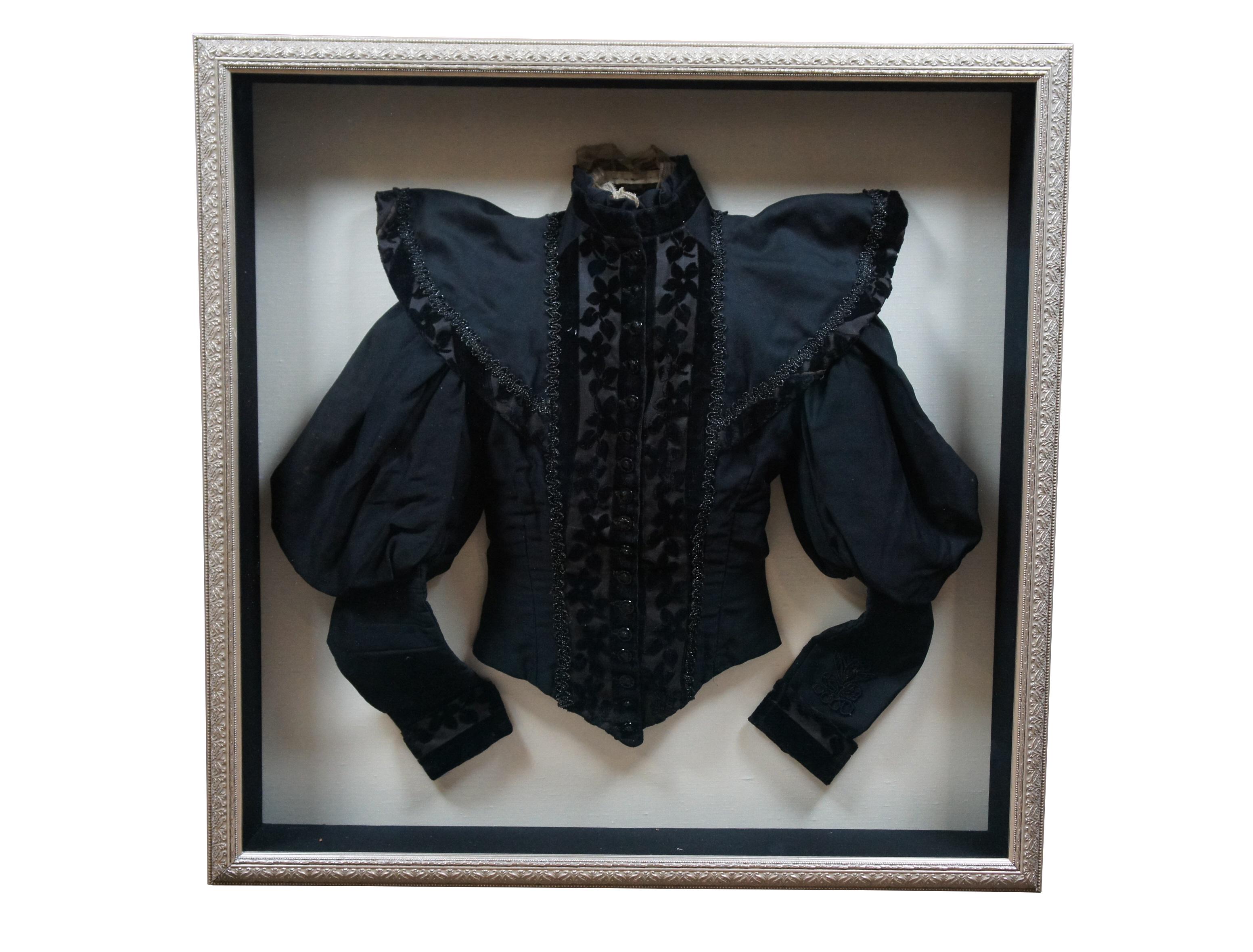 Impressive pair of circa 1890's Victorian women's dress tops. One elaborately layered black lace / mesh shirtwaist with leg of mutton / gigot sleeve. And one black bodice / jacket in cotton with floral burnt velvet accents at the cuffs, collar and