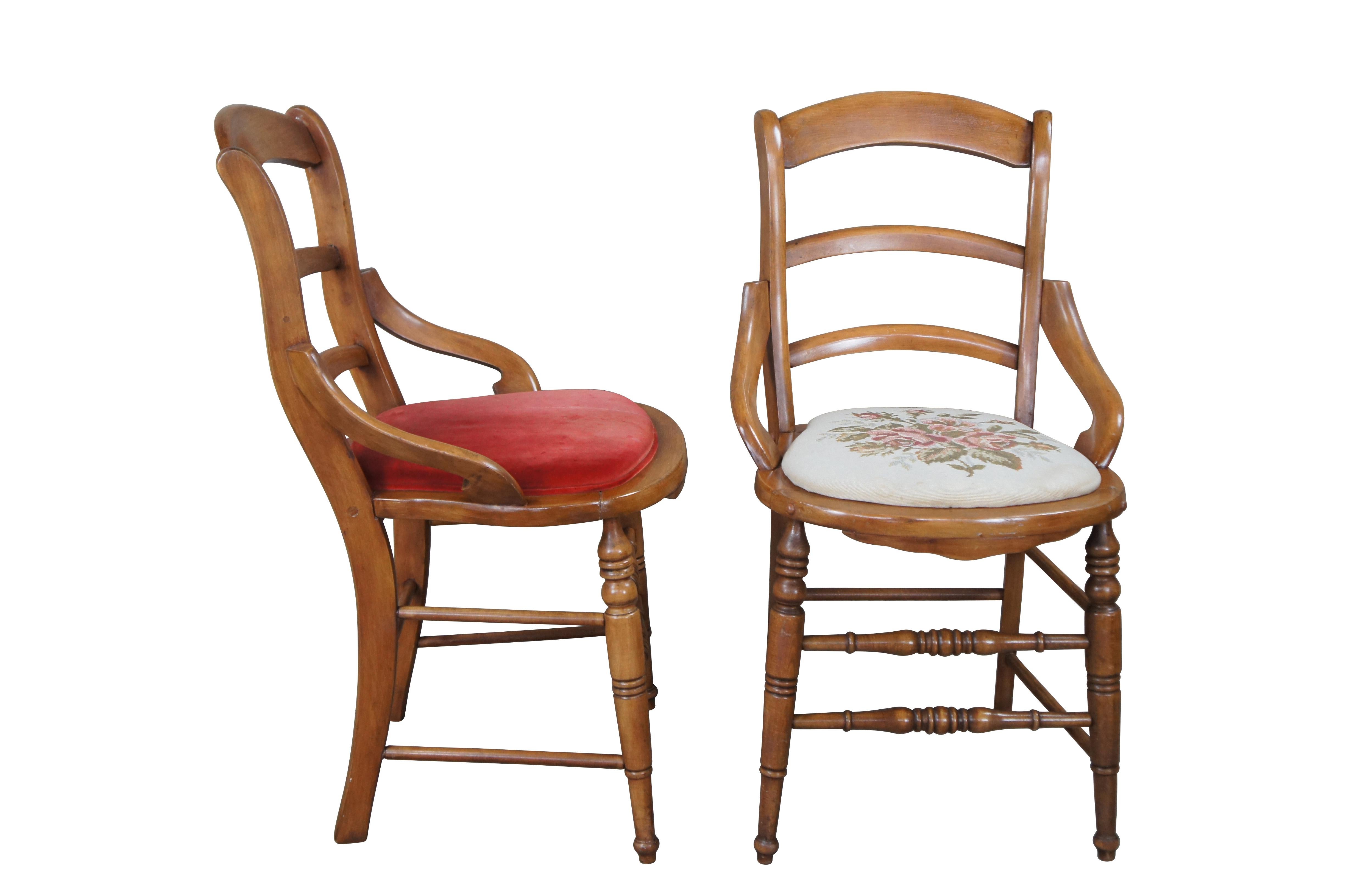 Two antique Victorian Eastlake parlor accent chairs. Made of maple featuring ladderback design with low arm, turned posts, and needlepoint / velvet seats. 

dimensions:
19