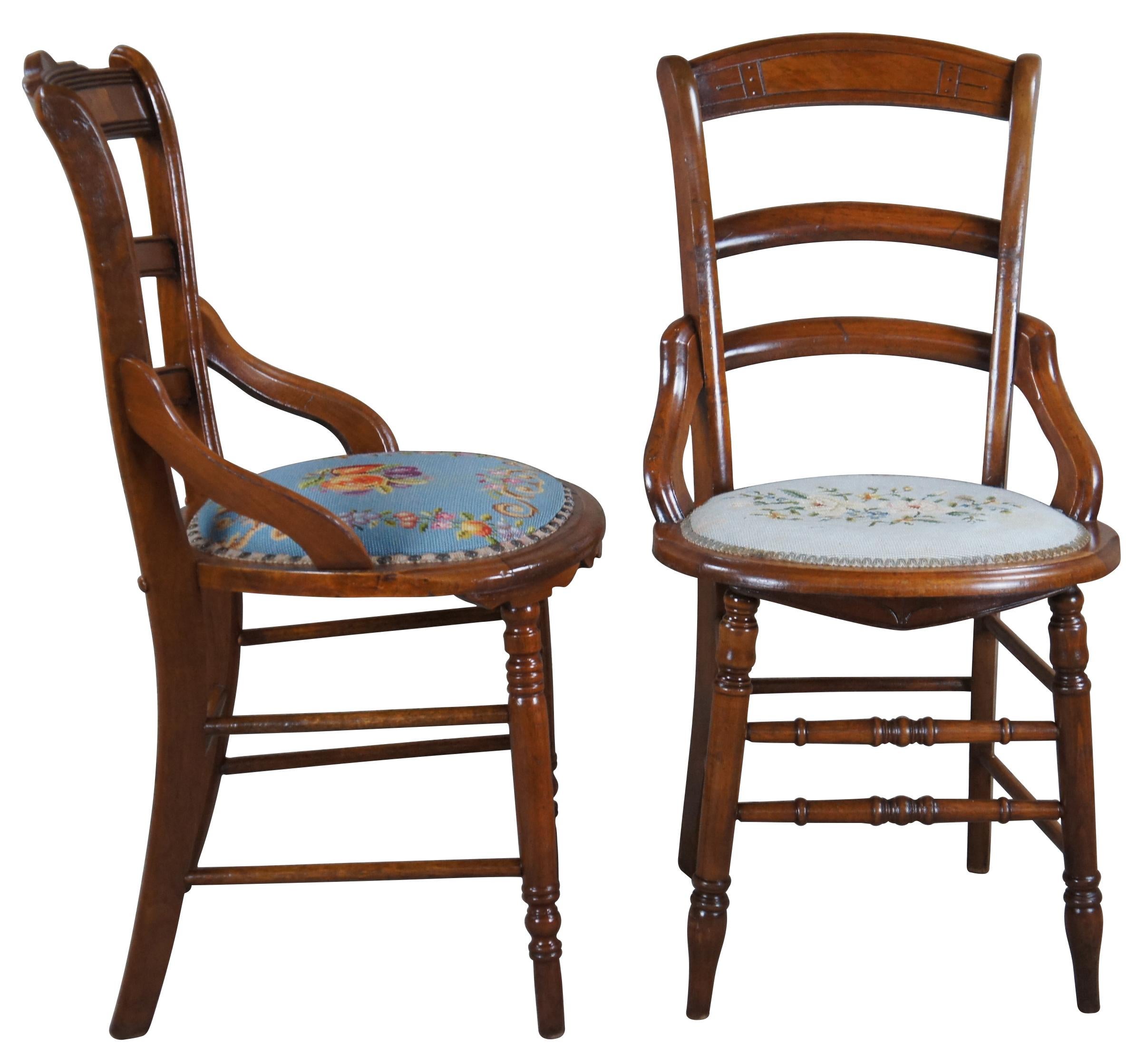 Two antique Victorian Eastlake parlor accent chairs. Made of walnut featuring turned posts, needlepoint seats, one with nail head accents, burl wood panel and cane.

Measures: 17.5