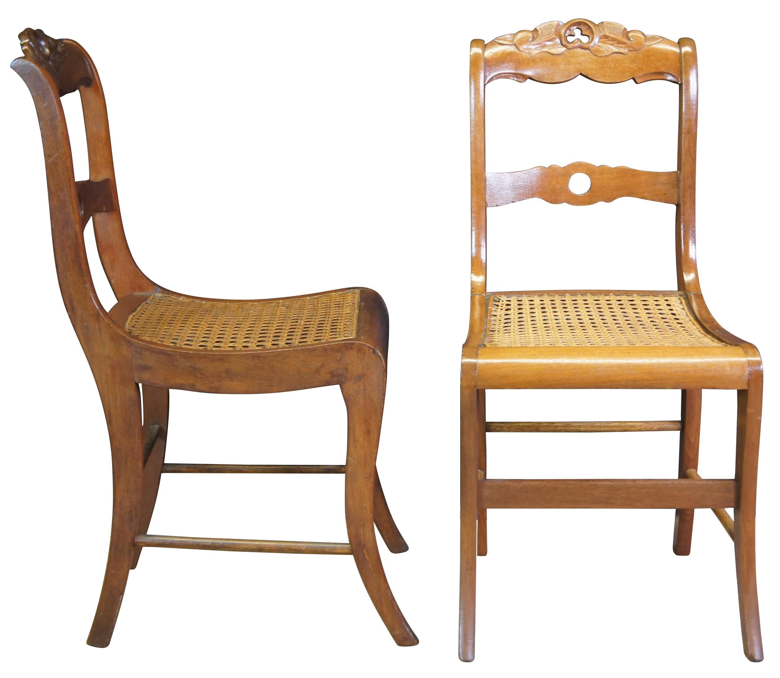 An elegant pair of 19th century side chairs. Made from walnut with caned seats. Features a serpentine carved rail with trefoil cut back.
 