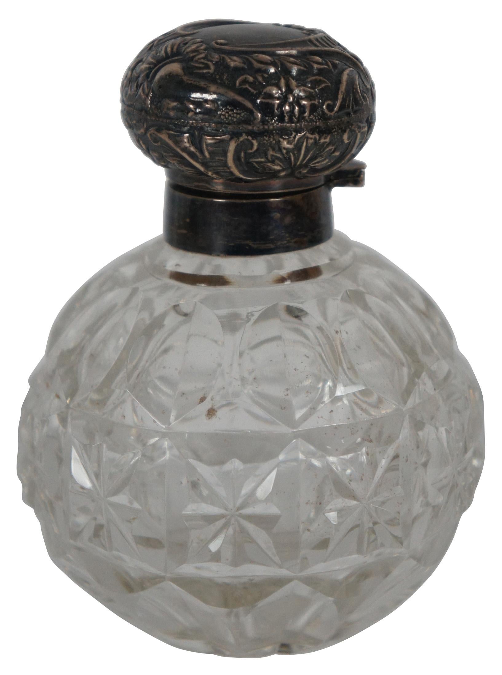 antique perfume bottles with silver tops