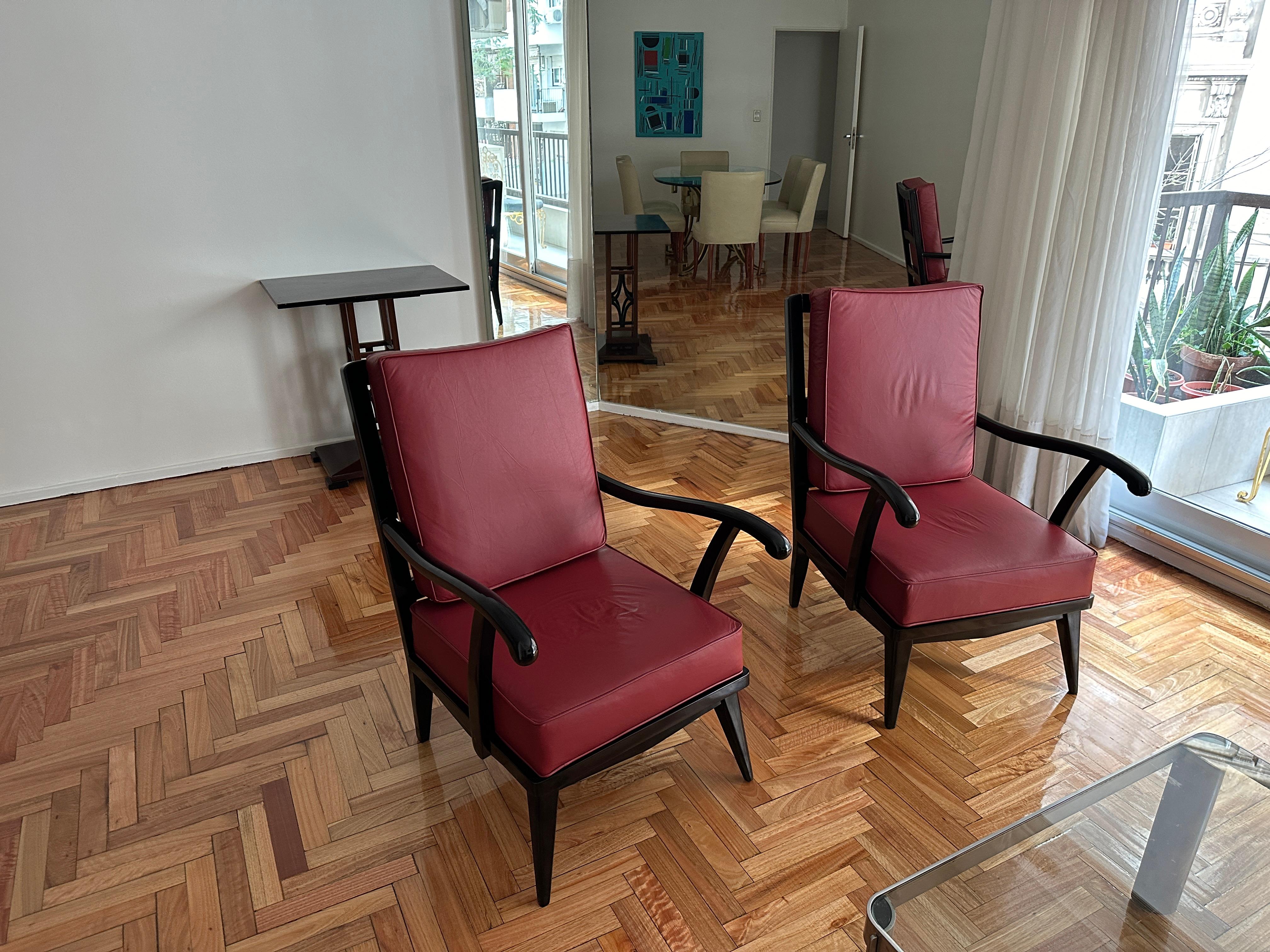 2 armchairs in leather 

Year 1960
Materials : Wood and leather
Finish: polyurethanic lacquer
Country: Italian
Elegant and sophisticated armchairs. 
We have specialized in the sale of Art Deco and Art Nouveau and Vintage styles since 1982.If you
