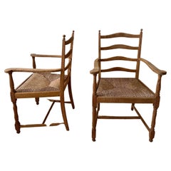 2 armchairs with classic french straw seat