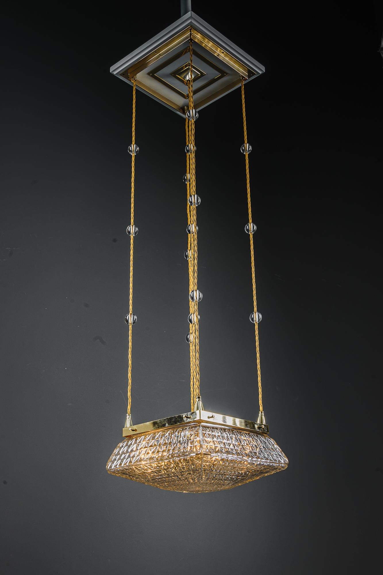 Brass 2 Art Deco Pendants with cut glass shades vienna around 1920s For Sale
