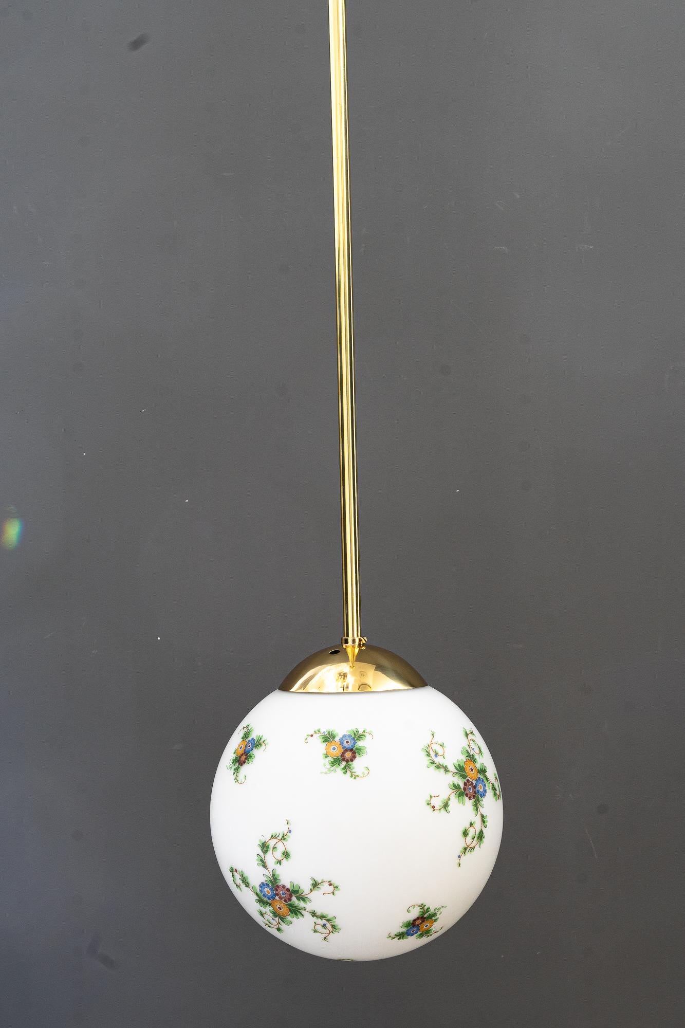 2 Art Deco pendants with hand painted glass vienna around 1920s
Brass polished and stove enameled
Pair price
