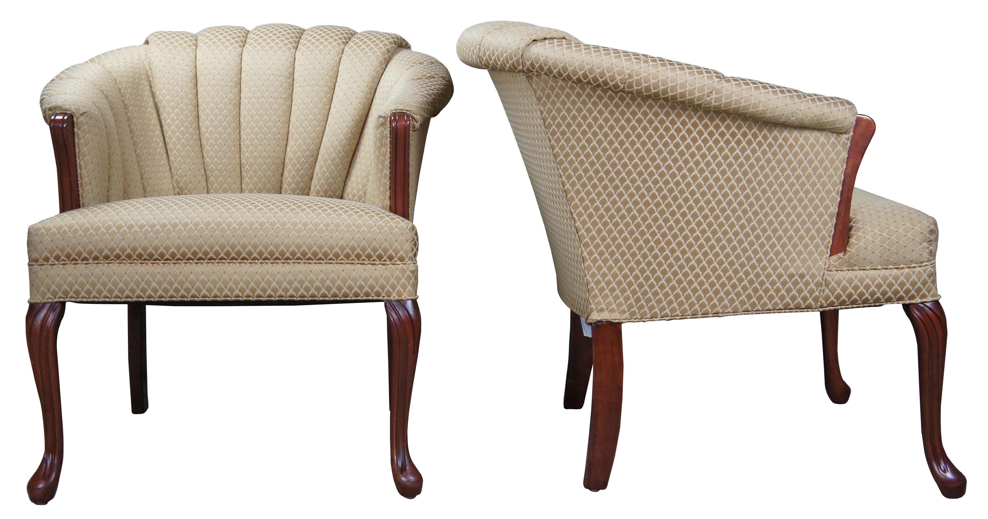 The Queen Anne accent chair by Best Chairs Inc. #0290DC. Features Art Deco styling with channel back upholstered in gold. Each chair features exposed wood frame made from cherry with Queen Anne legs.
  