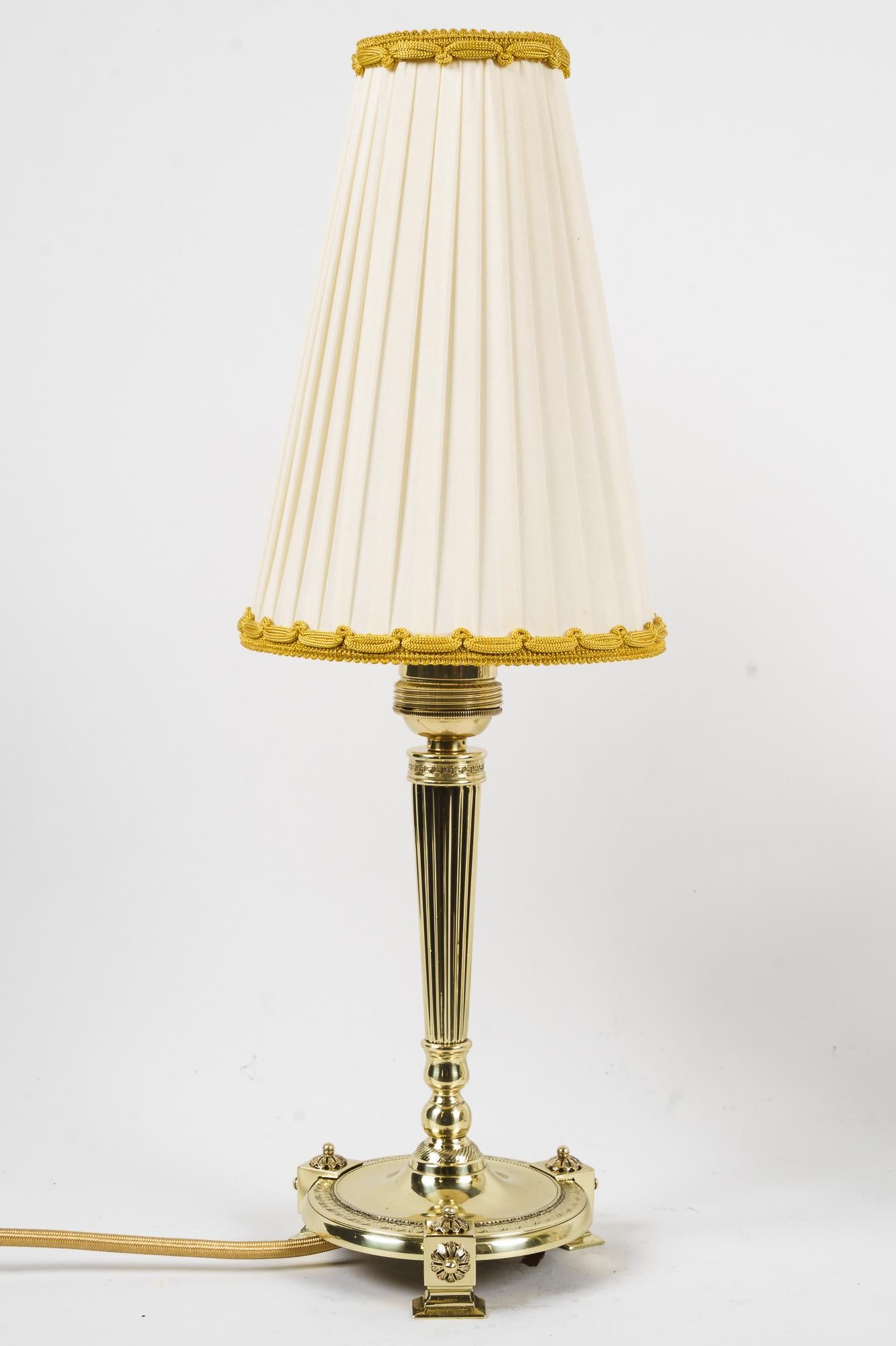 2 Art Deco table lamps Vienna 1920s
Polished and stove enameled
Original fabric shades.