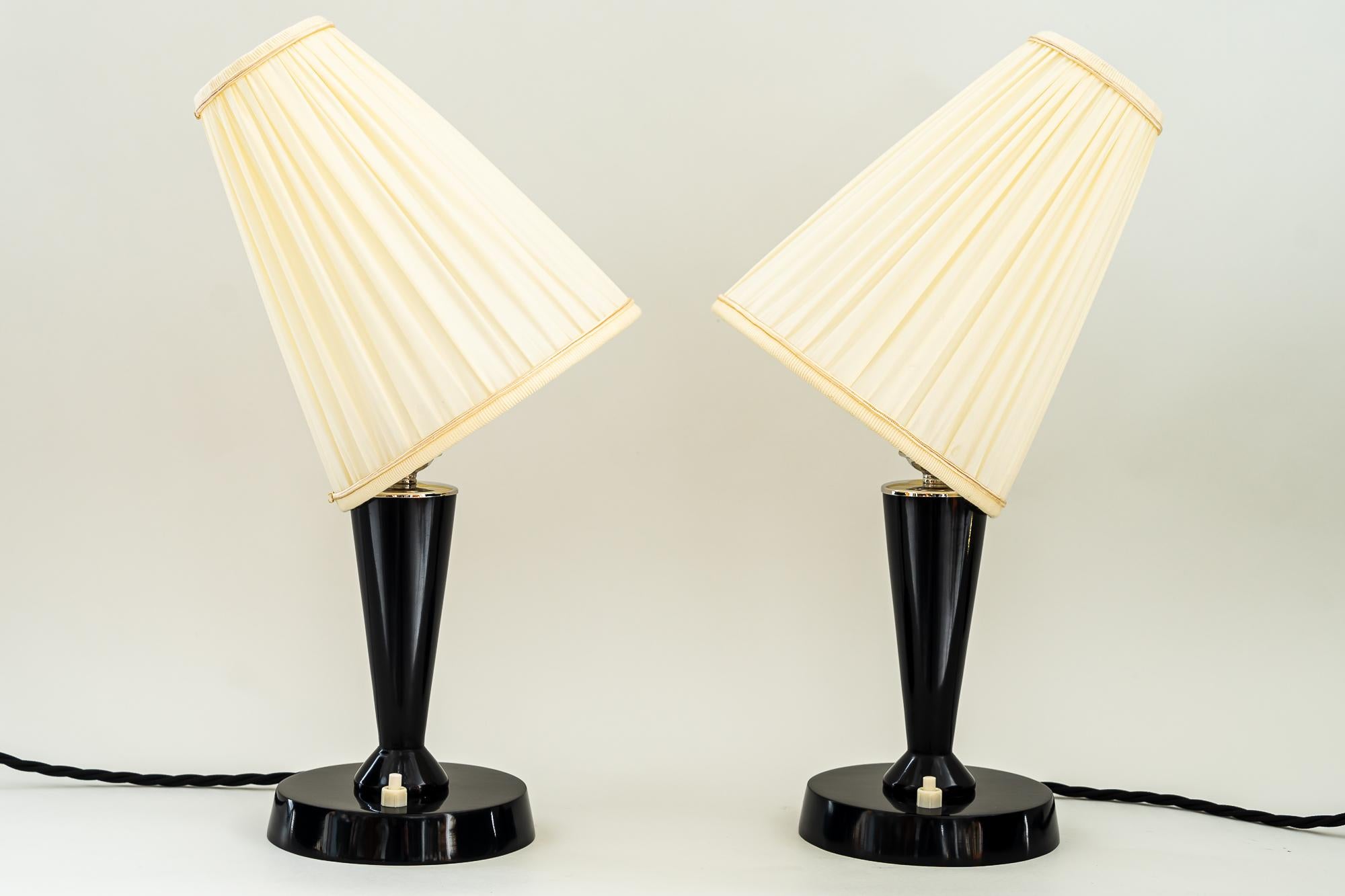 2 Art deco table lamps vienna around 1930s.
Wood polished.
The shade is replaced (new).