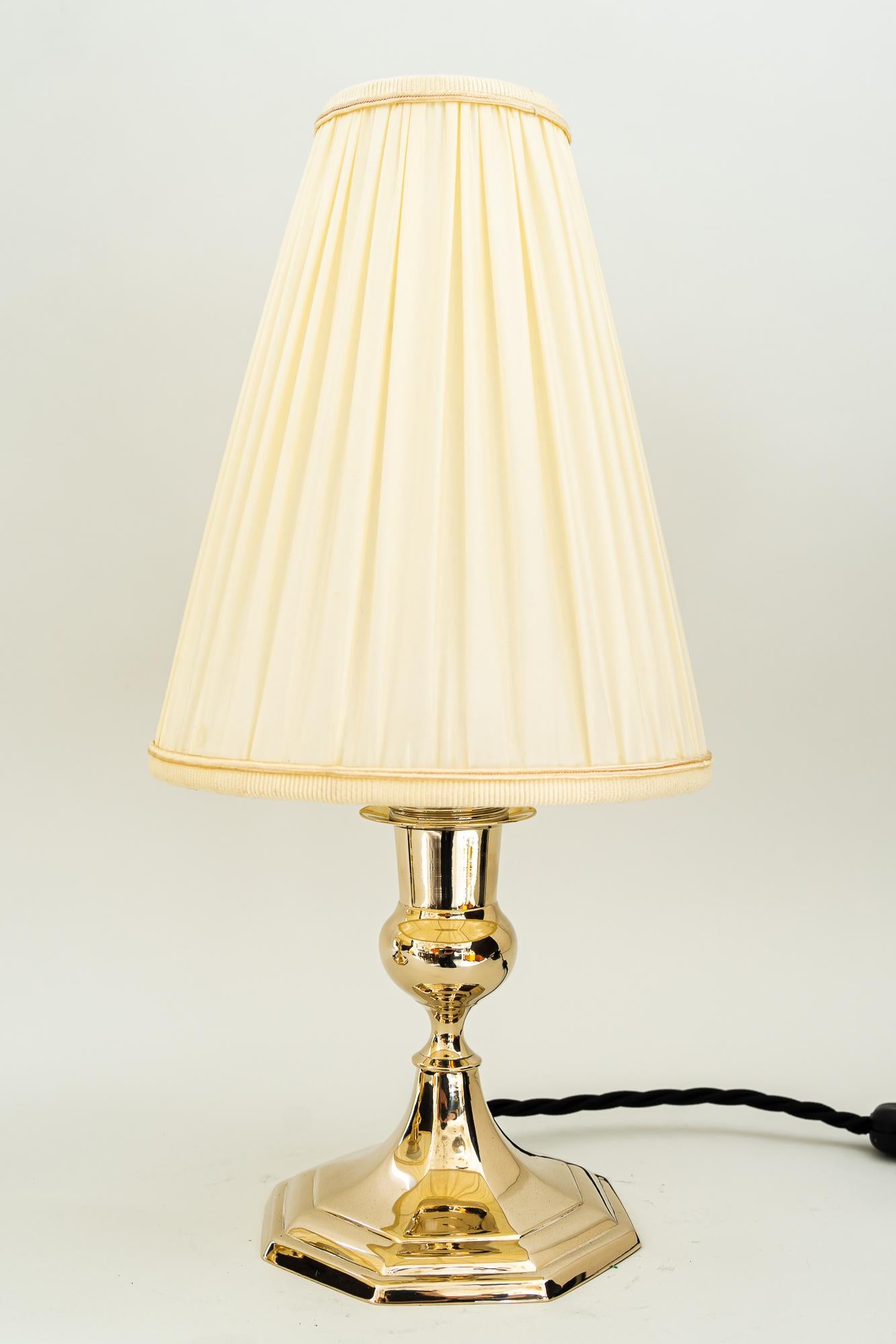 2 Art Deco table lamps with fabric shades, vienna around 1920s 
The shades are replaced (new).
Alpaca.
The socket is brass (nickel-plated).