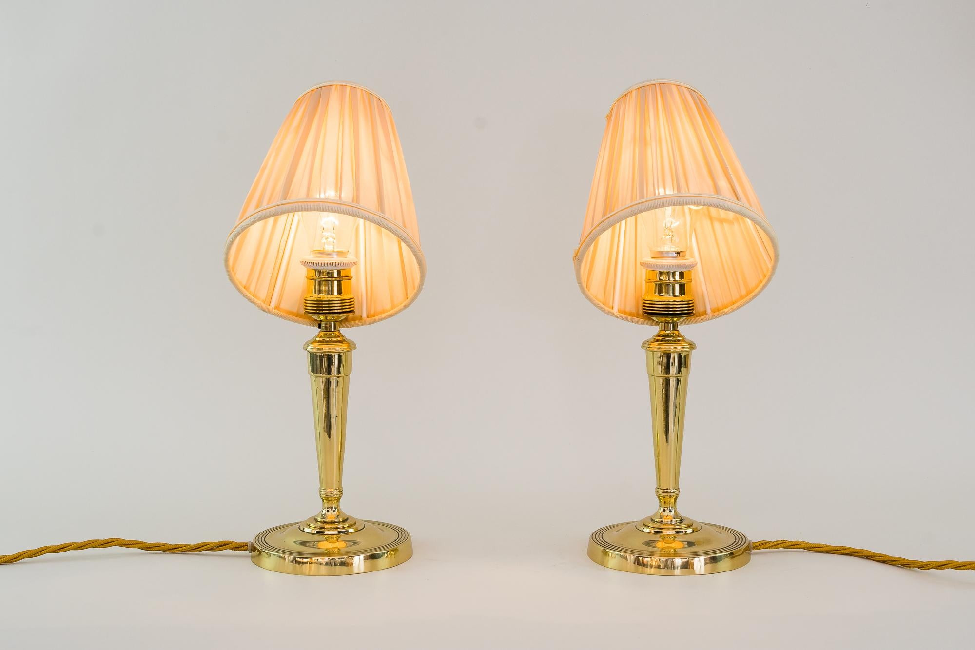 2 Art Deco table lamps, Vienna, around 1920s
Brass polished and stove enameled.