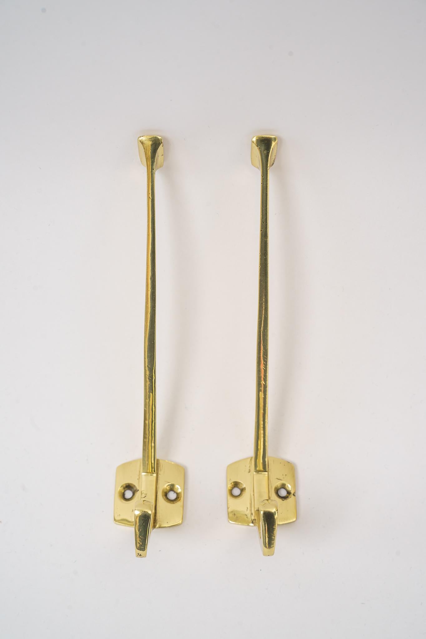 2 Art deco wall hooks Vienna around 1920s
Polished and stove enameled.